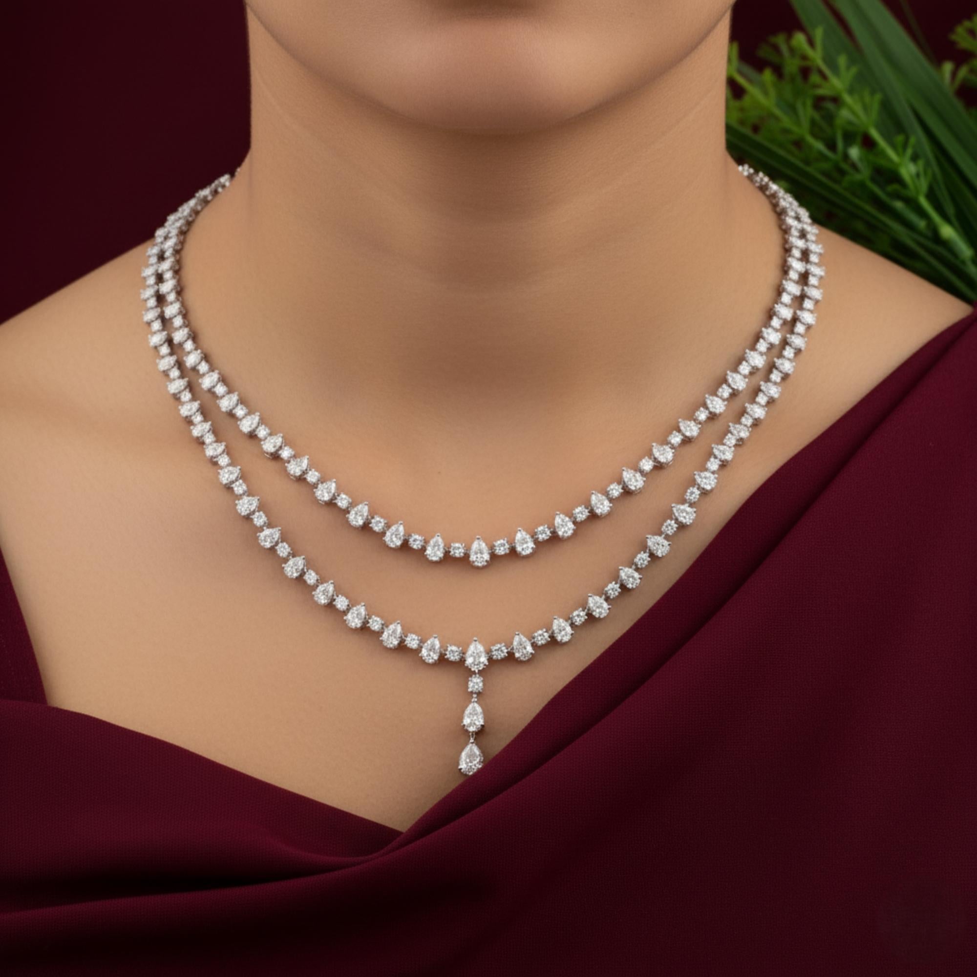 Oro blanco de 14 quilates 18,26 ct SI/H Collar de diamantes de dos vueltas Joyas de boda 
Este impresionante collar muestra un diseño en cascada de dos capas. Cada tira está delicadamente adornada con brillantes diamantes en forma de pera. La capa