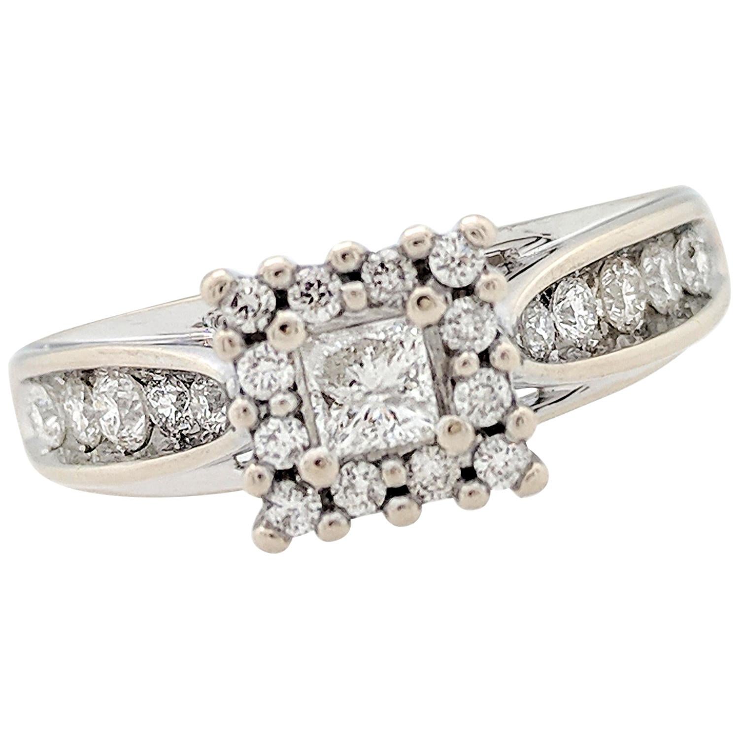 14 Karat White Gold .20 Carat Princess Cut Diamond Halo Engagement Ring