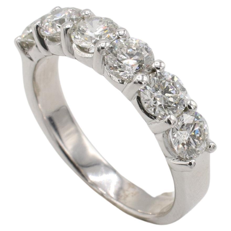 14 Karat White Gold 2.00 Carat Natural Diamond Half Round Wedding Band Ring 
Metal: 14k white gold
Weight: 4.72 grams
Diamonds: 6 round brilliant diamonds approx. 2.00 CTW G-H SI2-I1
Size: 7.75 (US)
Width: 4.5mm
