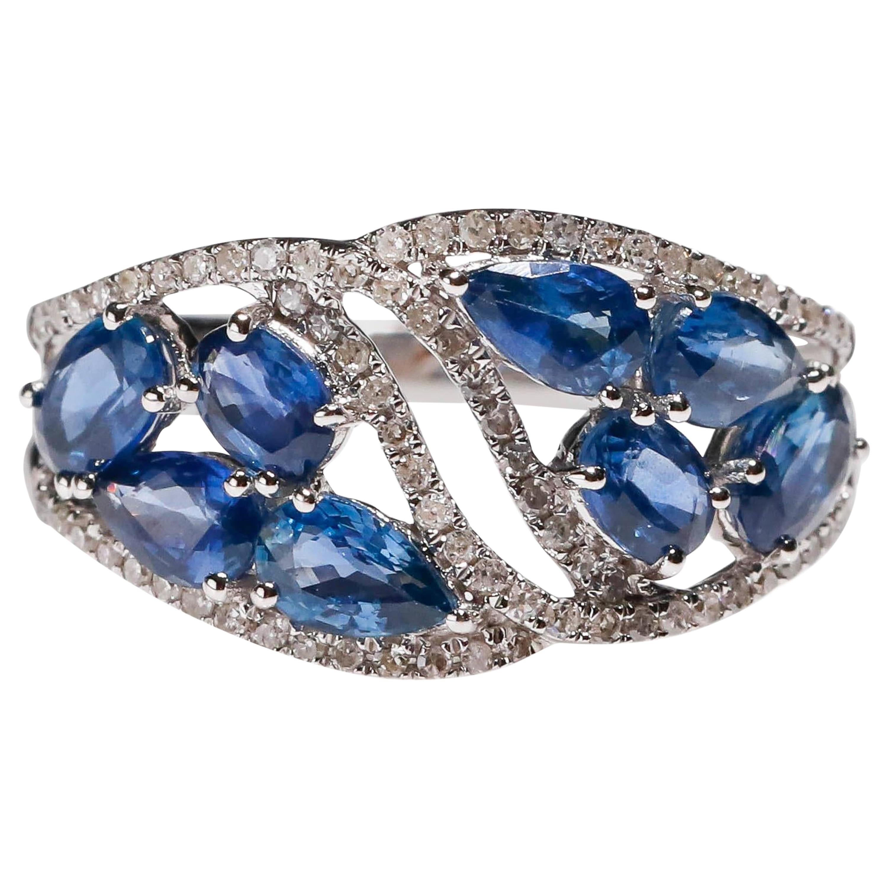14 Karat White Gold 2.24 Carat Oval Blue Sapphire 0.22 Carat Diamond Band Ring

Crafted in 14kt White Gold, this Unique design showcases a Blue Sapphire Bridal designs, set in a halo of round-cut mesmerizing diamonds, Polished to a brilliant