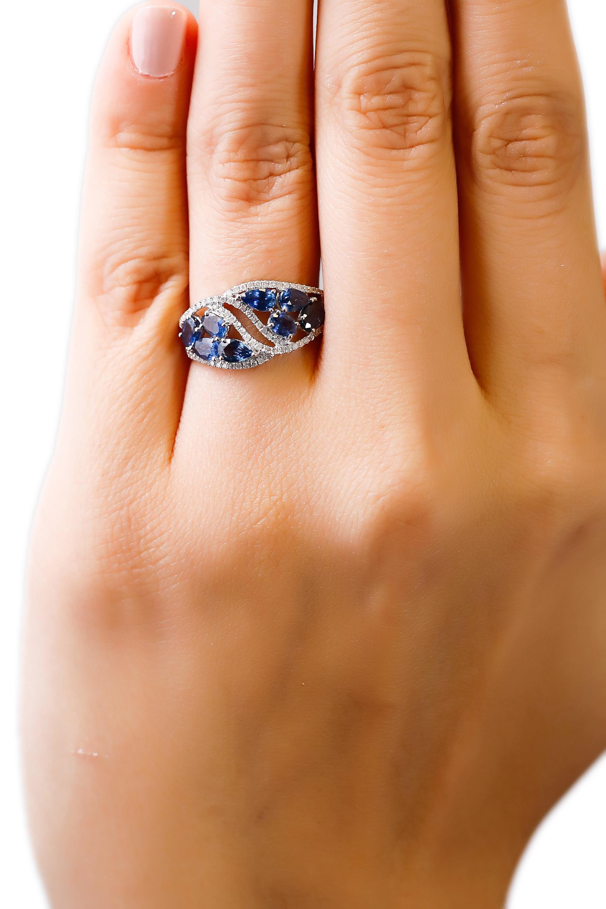 Artisan 14 Karat White Gold 2.24 Carat Oval Blue Sapphire 0.22 Carat Diamond Band Ring