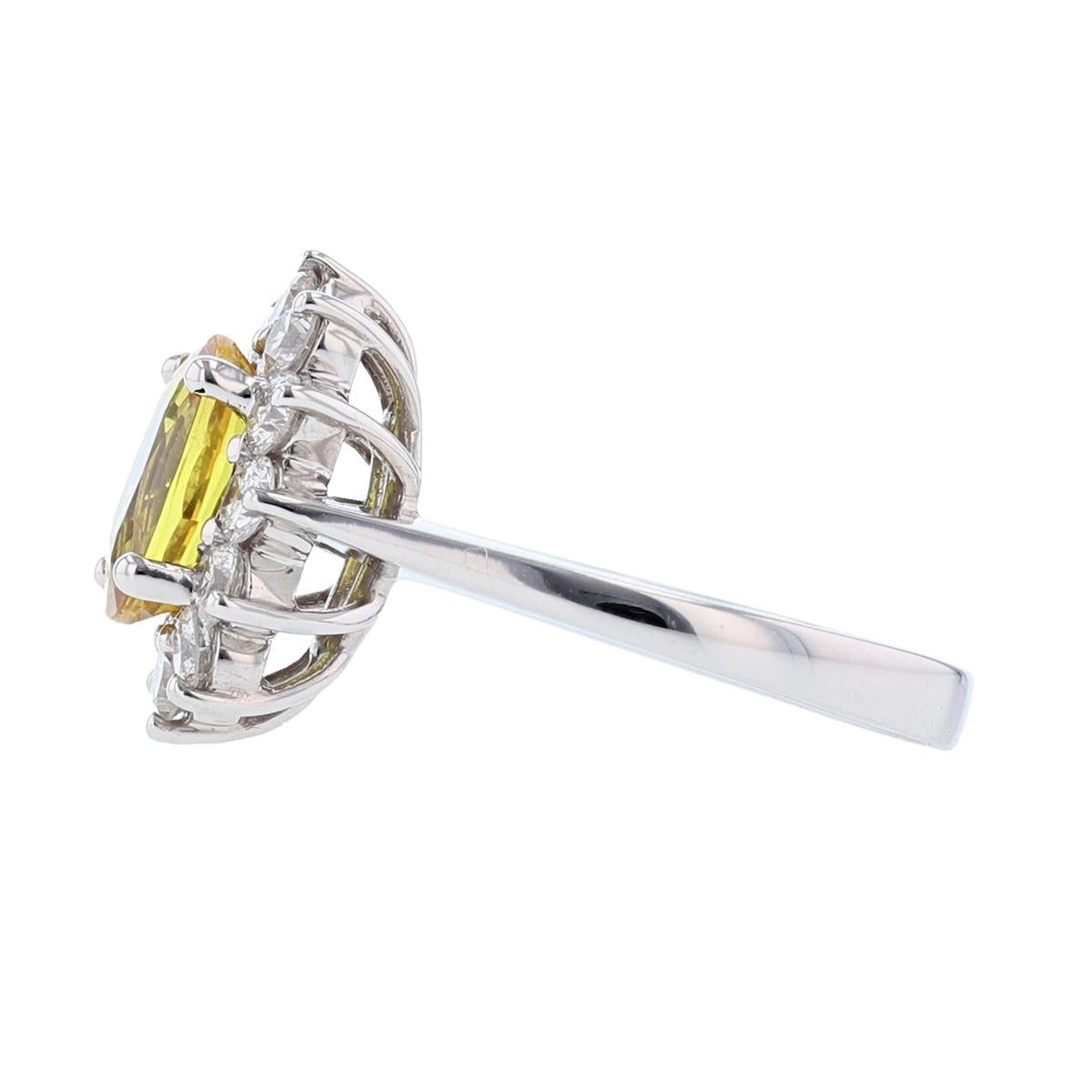 Contemporary 14 Karat White Gold 2.49 Carat Oval Yellow Sapphire Diamond Ring For Sale