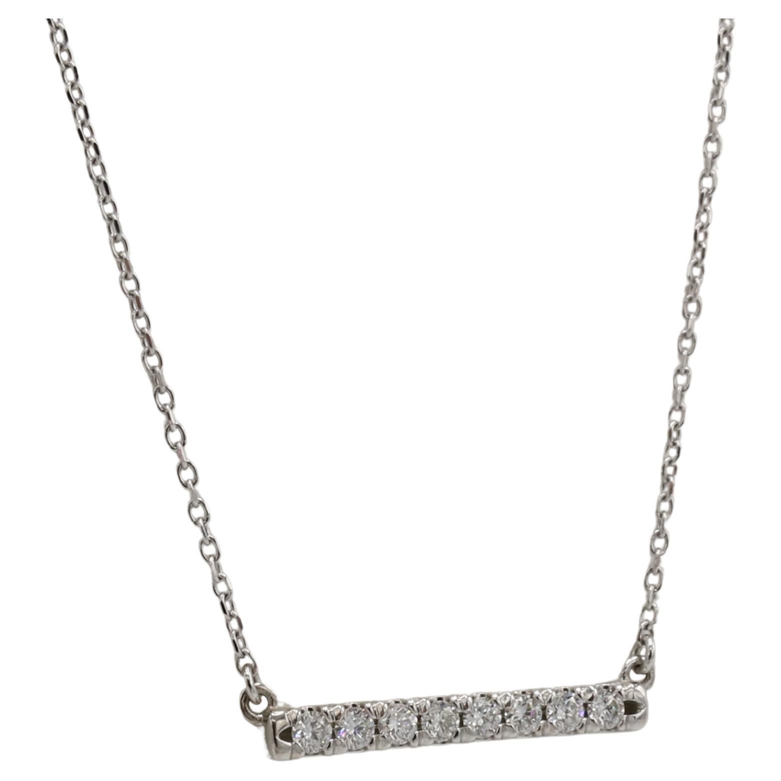 14K White Gold .25 Carat Natural Diamond French-Set Bar Necklace
Metal: 14k white gold
Weight: 1.86 grams
Diamonds. 0.25 carats G-H VS round diamonds
Bar: 19.5mm
Chain length: 16 inches
Note: Also available in yellow gold
