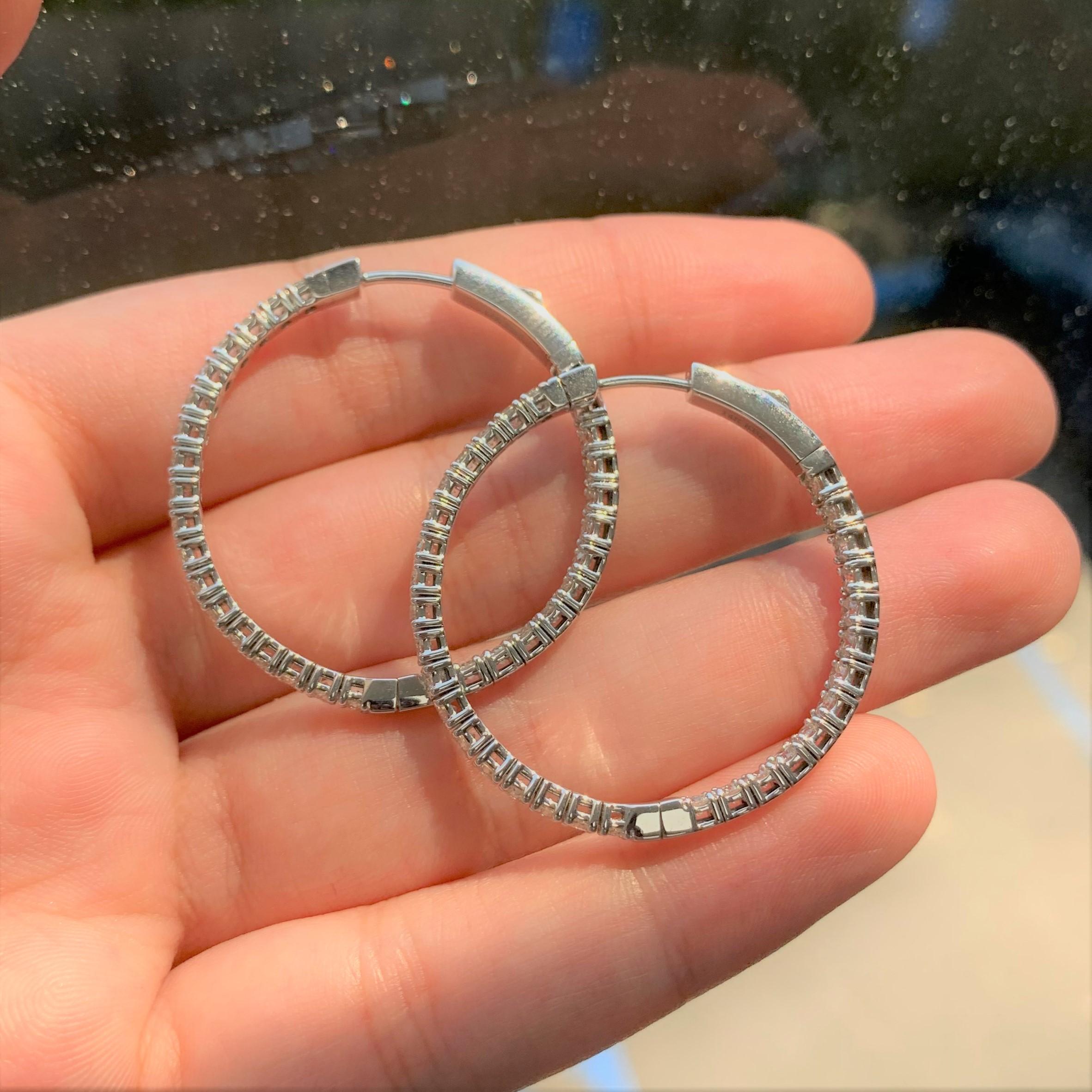 These Classic and Elegant Diamond Oval Hoop Earrings will frame your face beautifully! Crafted of 14K White Gold these earrings feature approximately 2.75 ct. of Natural Round Diamonds. Diamond Color and Clarity is GH-SI1. Insert Latch for