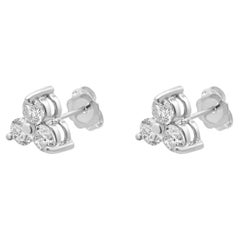 Boucles d'oreilles en or blanc 14 carats à 3 diamants