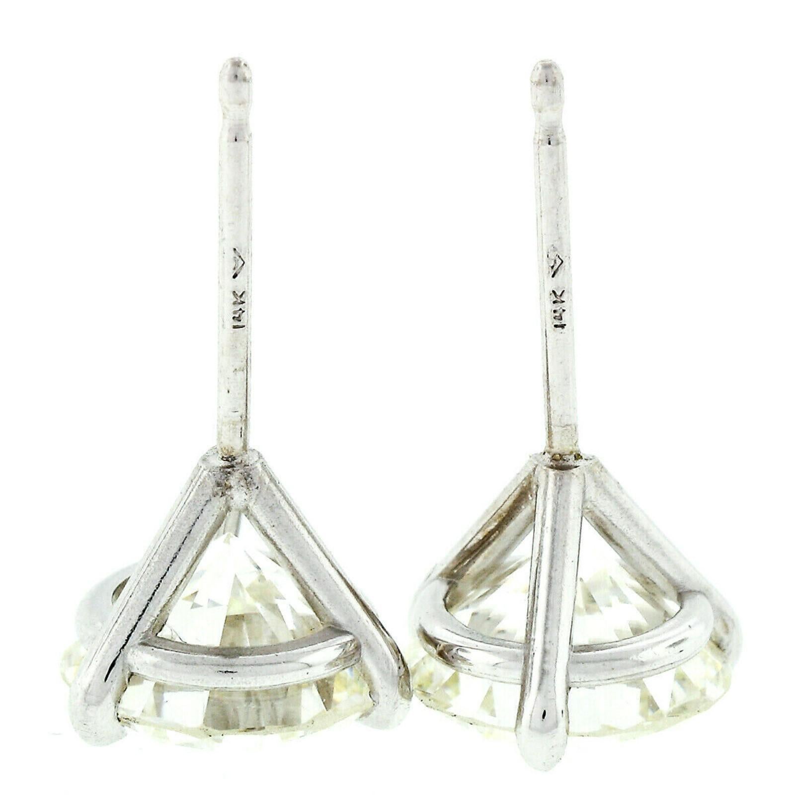 14 Karat White Gold 3.03 Carat Martini Prong Set GIA Round Diamond Stud Earrings For Sale 1