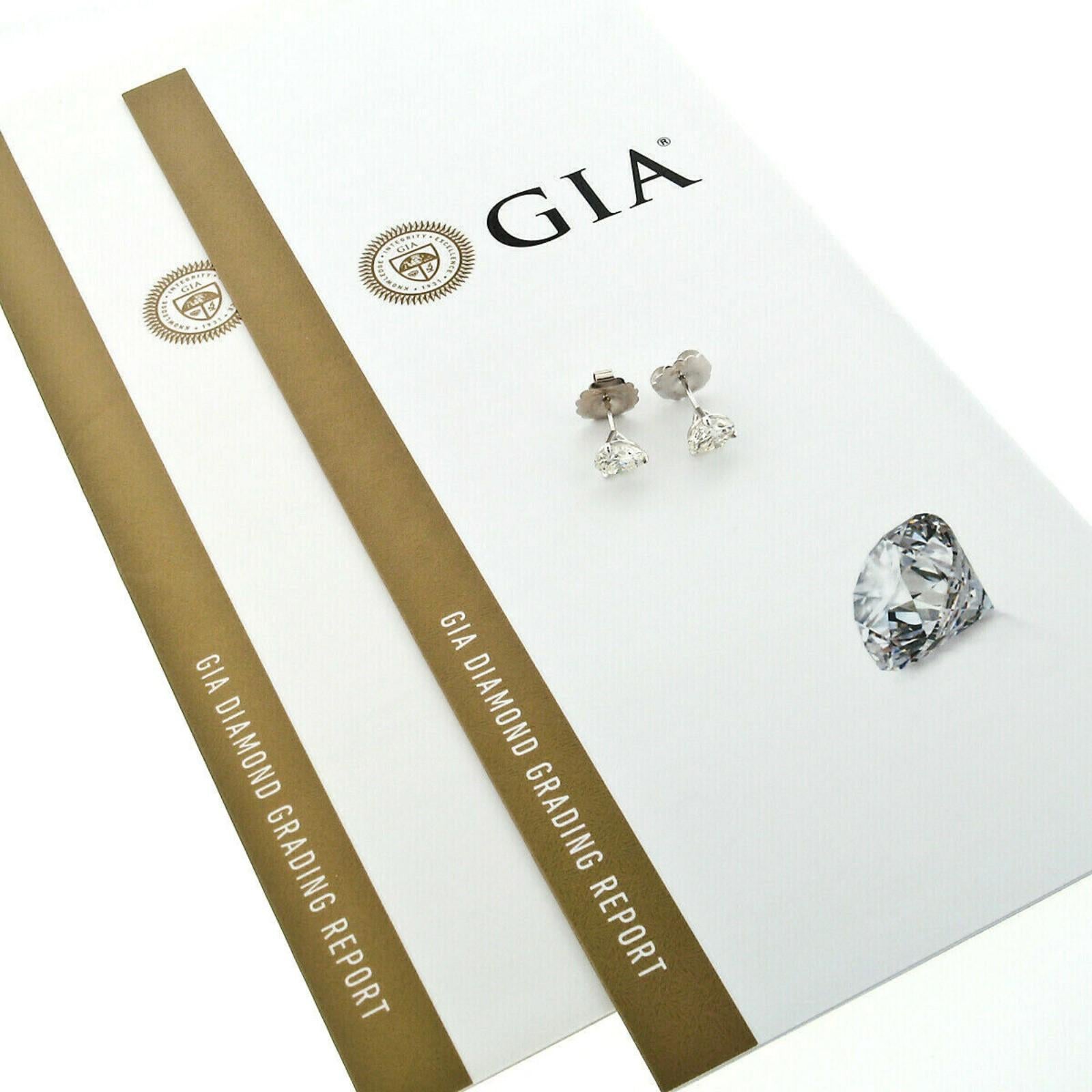 14 Karat White Gold 3.03 Carat Martini Prong Set GIA Round Diamond Stud Earrings For Sale 2