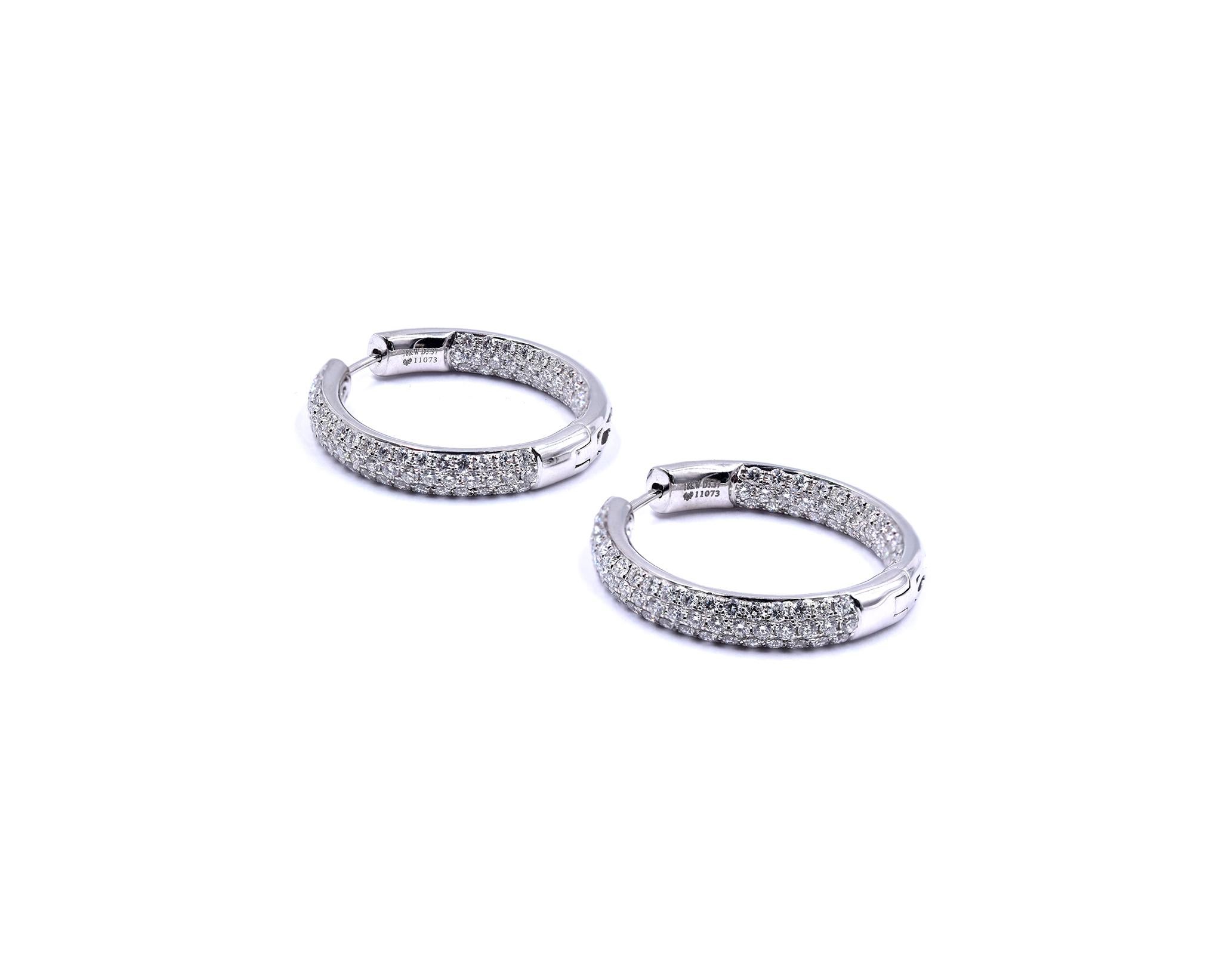 Material: 14K white gold
Diamonds: 178 round cut = 2.67cttw
Color:  G
Clarity: VS
Dimensions: earrings measure 30mm
Weight: 14.21 grams
