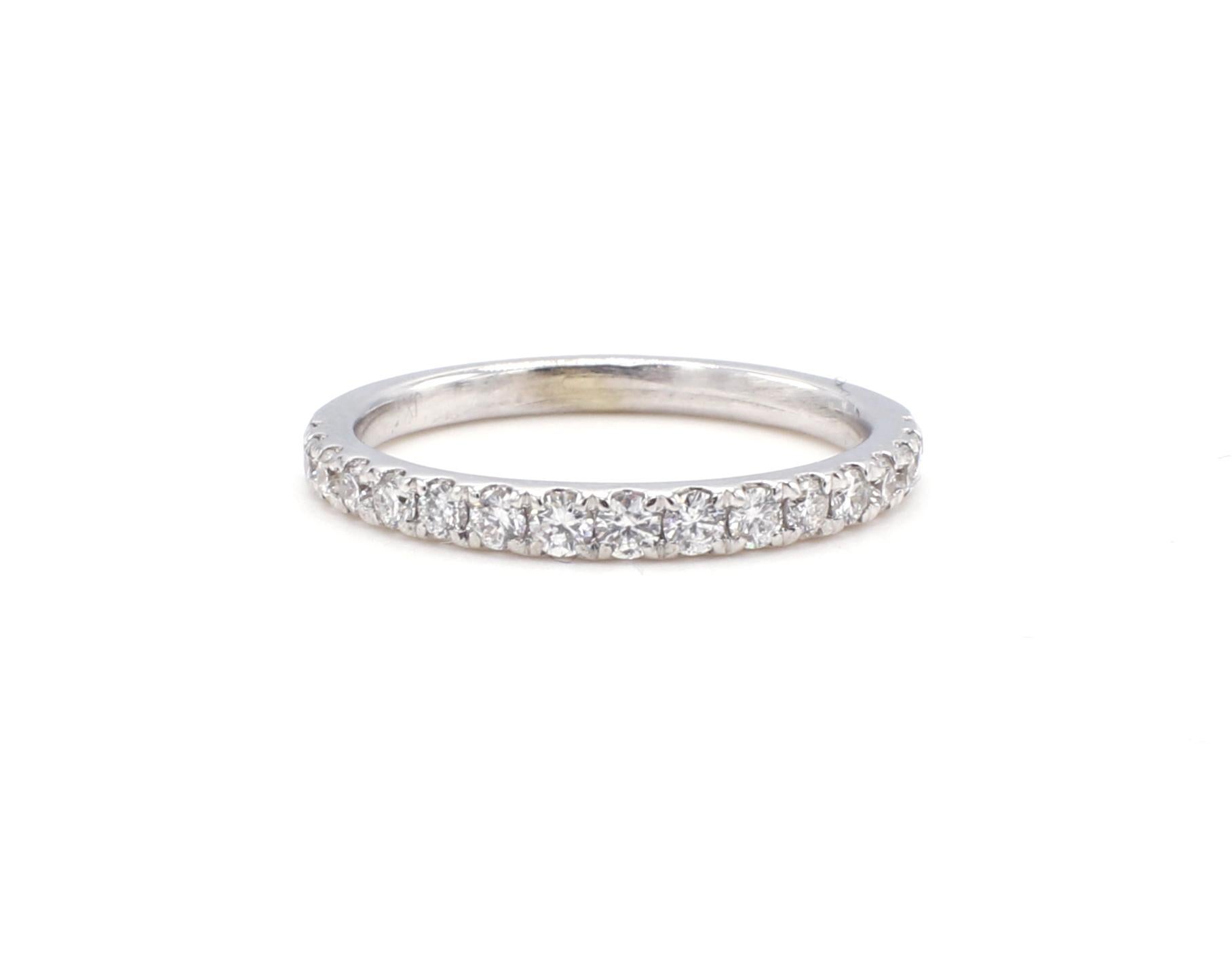 14 Karat White Gold .32 Carat Round Natural Diamond Half Wedding Band Ring

Metal: 14k white gold
Weight: 1.78 grams
Diamonds: Approx. .32 CTW G-H VS round natural diamonds
Size: 5 (US)
Width: 2mm