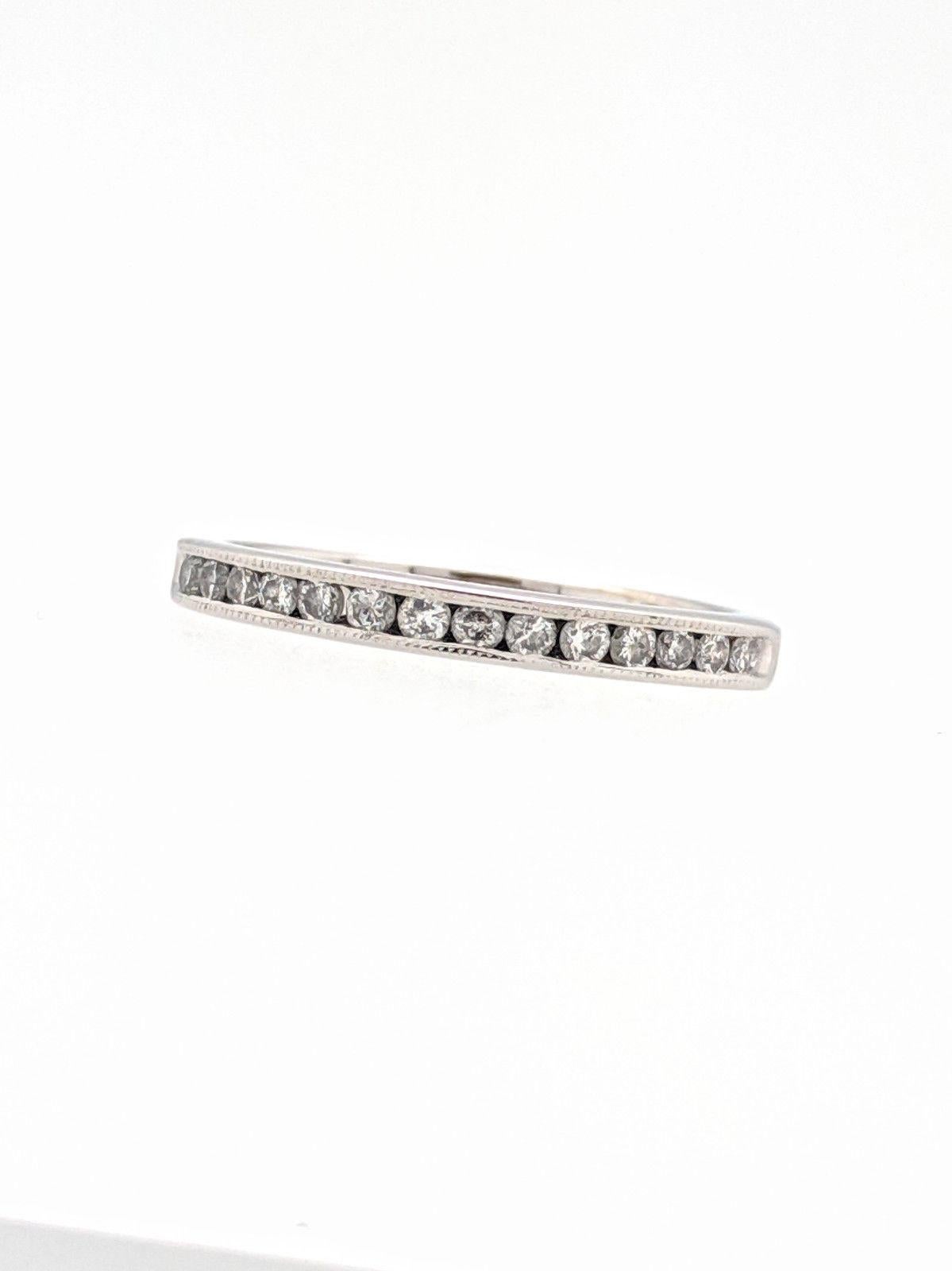 14K White Gold .35ctw Diamond Channel Set Stackable Wedding Band Ring

You are viewing a beautiful channel set diamond wedding band with beaded edges. This ring is crafted from 14k white gold and weighs 2.7 grams. It features natural round brilliant