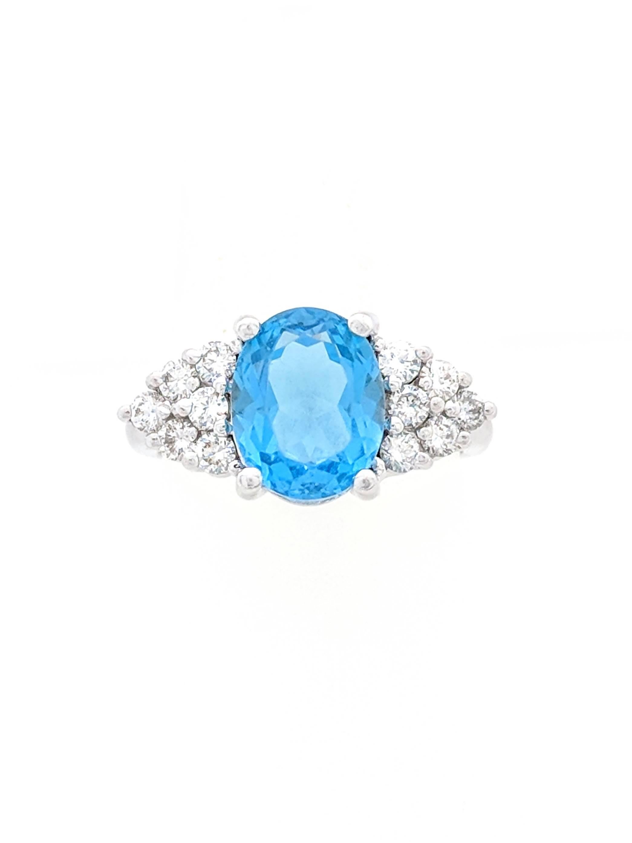 Round Cut 14 Karat White Gold 3.50 Carat Blue Topaz and Diamond Cocktail Ring For Sale