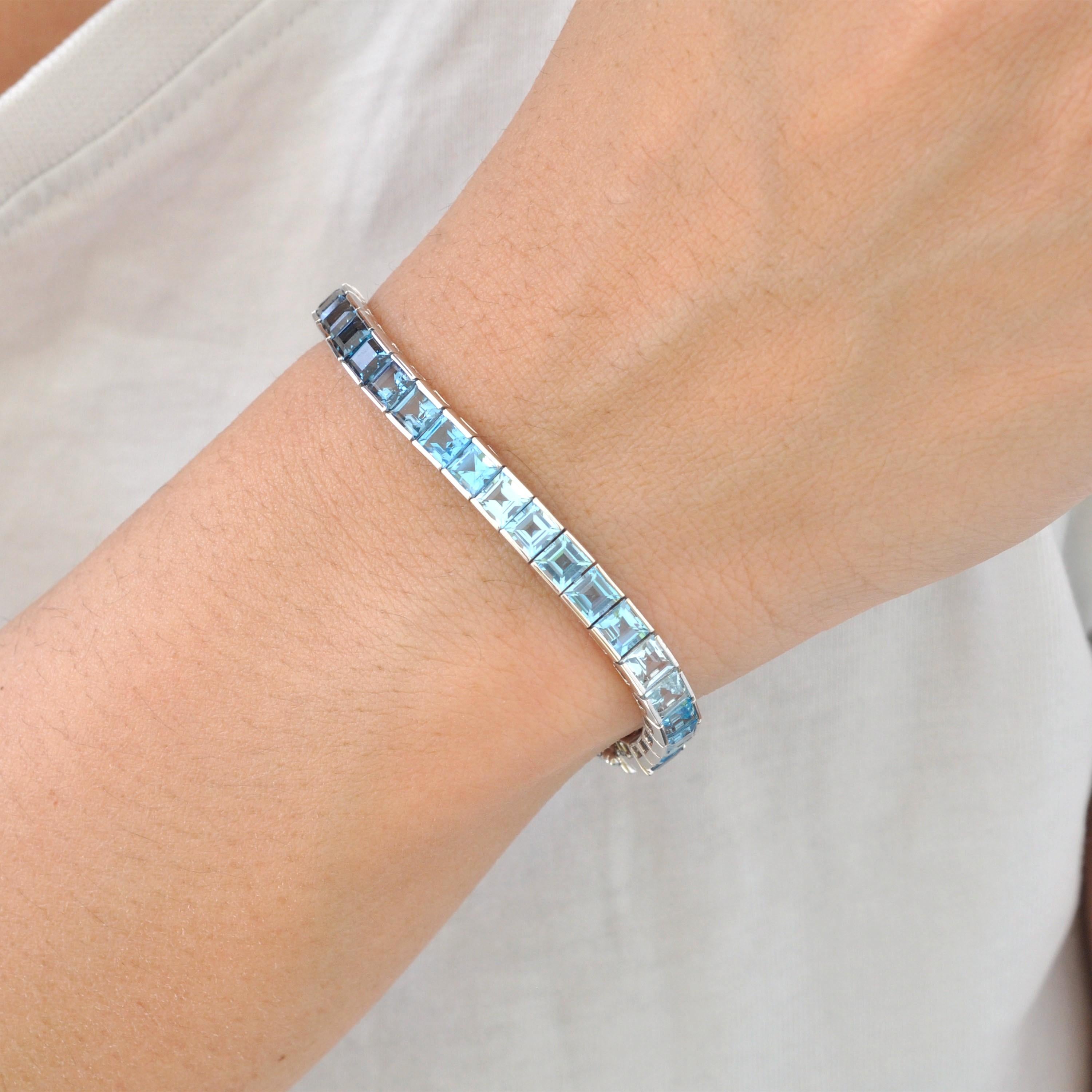Contemporary 14 Karat White Gold 4 MM Square Cut Blue Topaz Gemstones Tennis Link Bracelet For Sale