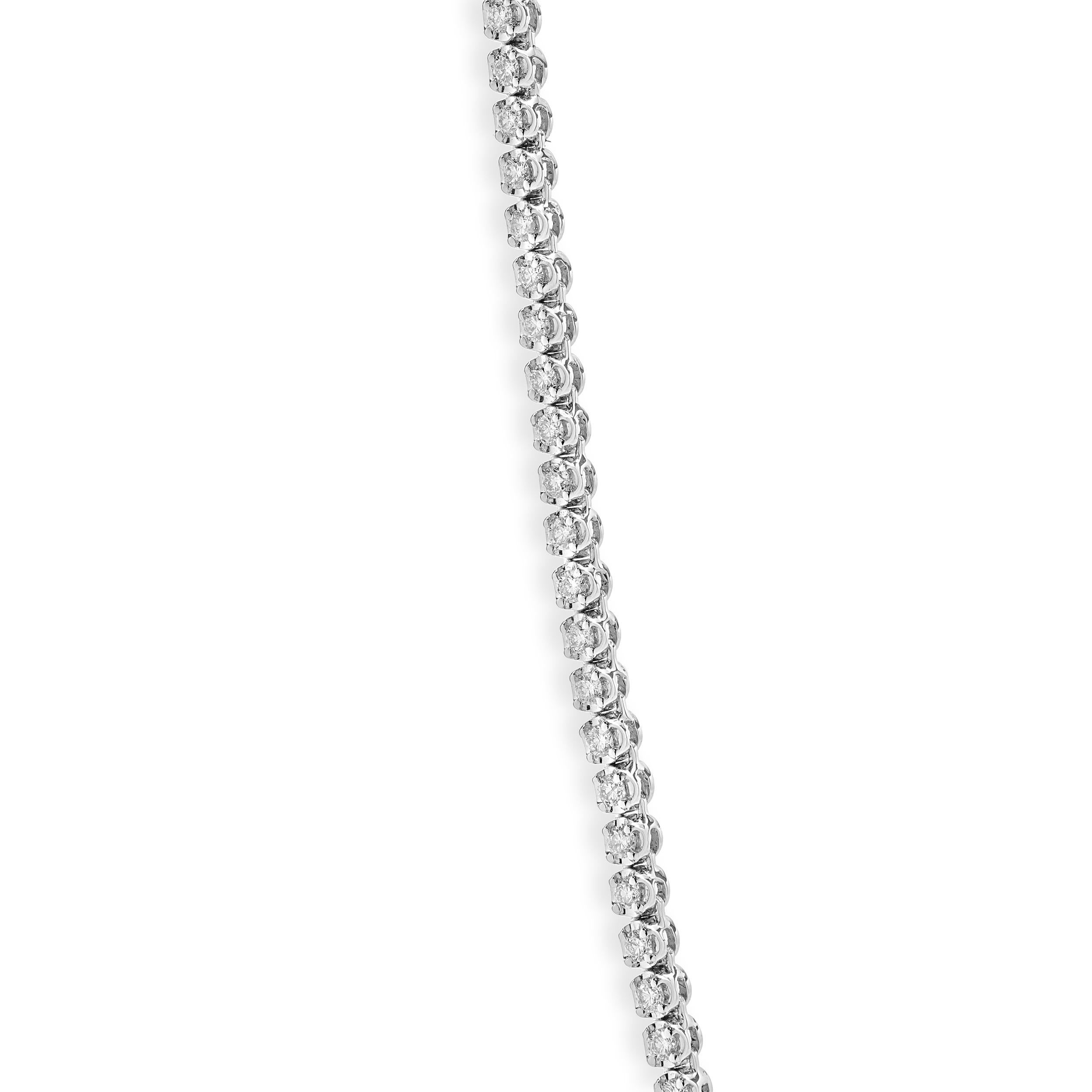 Designer: custom
Material: 14K white gold
Diamond: 178 round brilliant cut = 3.21cttw
Color: G
Clarity: VS
Dimensions: necklace measures 18-inches in length
Weight: 17.68 grams
