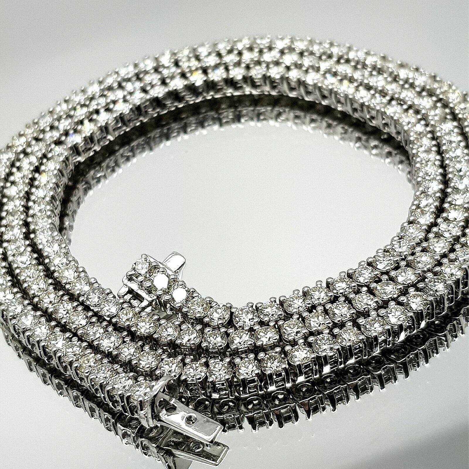 About
18k white gold 4 prong diamond necklace, containing 
 Specifications:
    main stone: ROUND CUT DIAMONDS
    diamonds: 136 PIECES
    carat total weight: 16.98cts.
    color: F-G
    clarity: VS1-2
    brand: custom
    metal:  18K GOLD
   