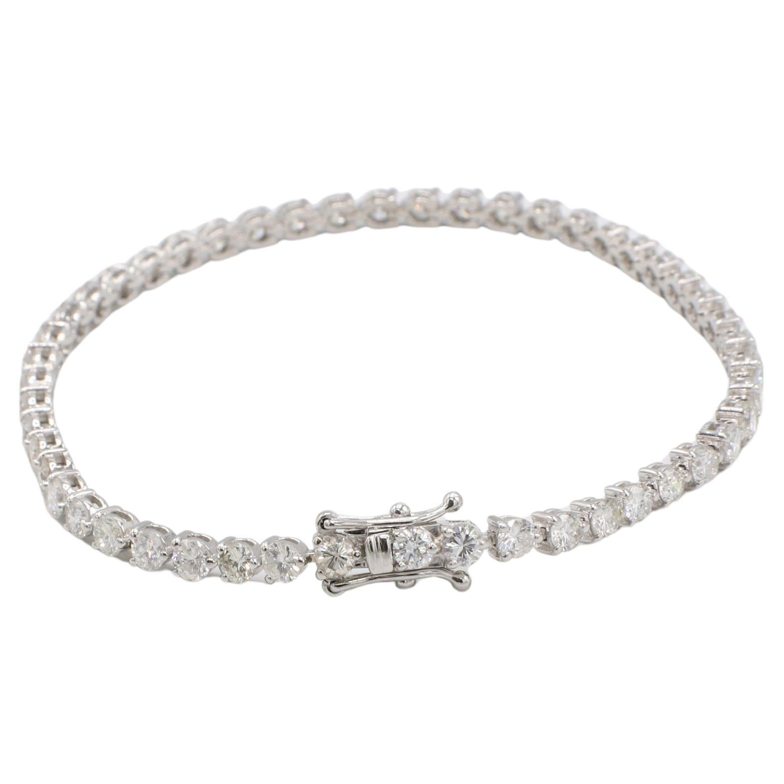 14 Karat Weißgold 4,42 Karat Naturdiamant Tennis Line Armband 
Metall: 14k Weißgold
Gewicht: 8.06 Gramm
Diamanten: 4,42 CTW H-I VS-SI runde Naturdiamanten
Länge: 7 Zoll
Breite: 3 mm
