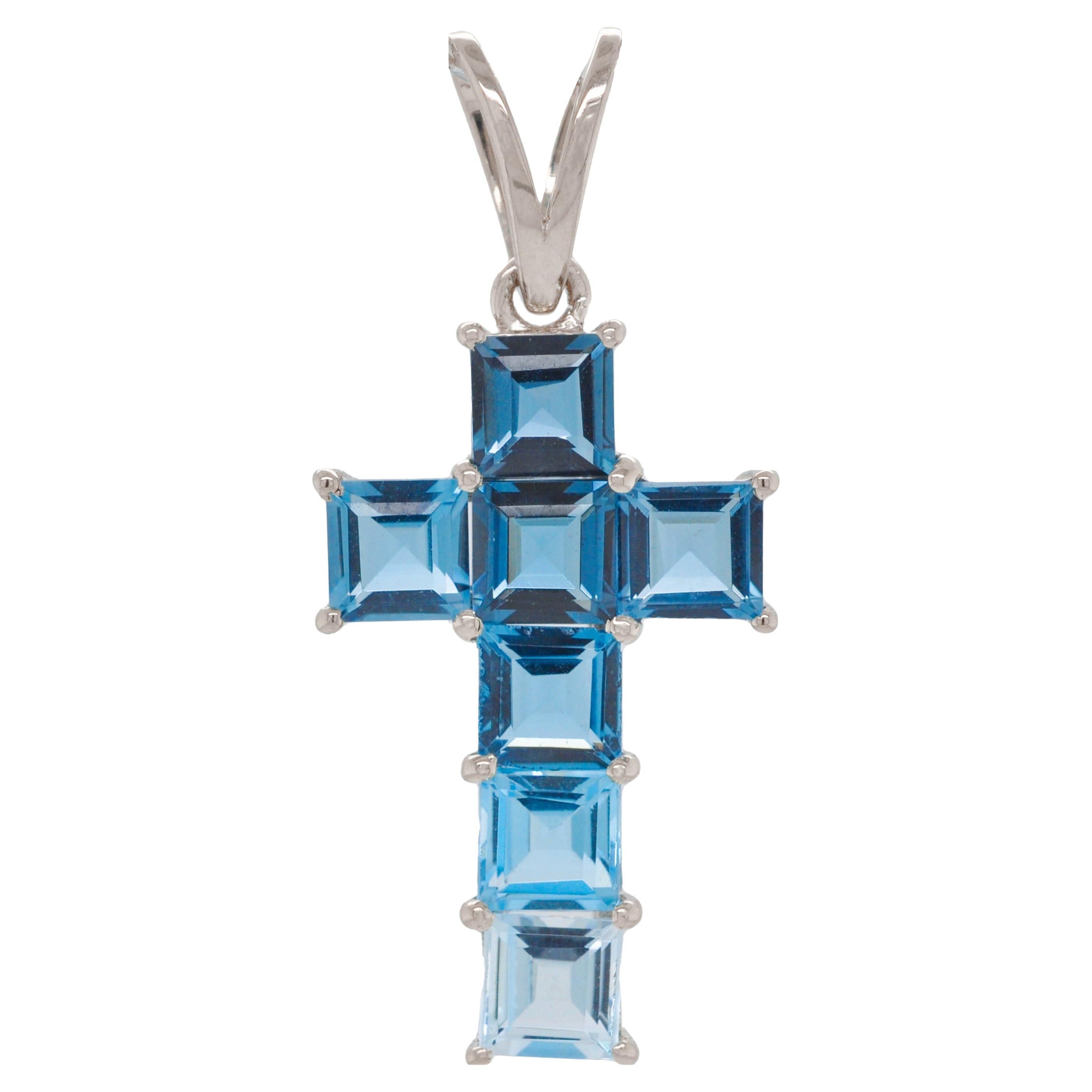 14 Karat White Gold 4MM Square Blue Topaz Gemstones Prong Set Cross Pendant.