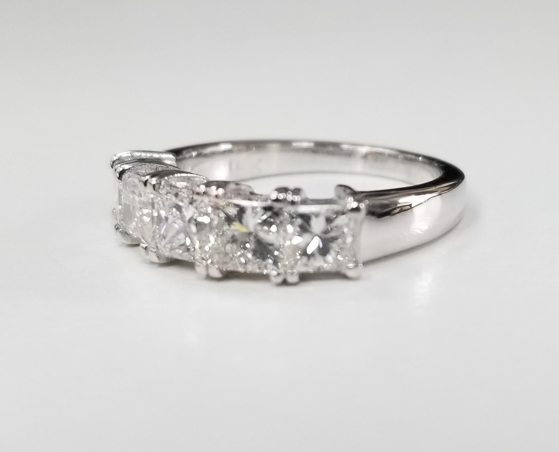 14k white gold 5 stone princess cut diamond Anniversary ring 1.80cts., containing 5 princess cut diamond; color 