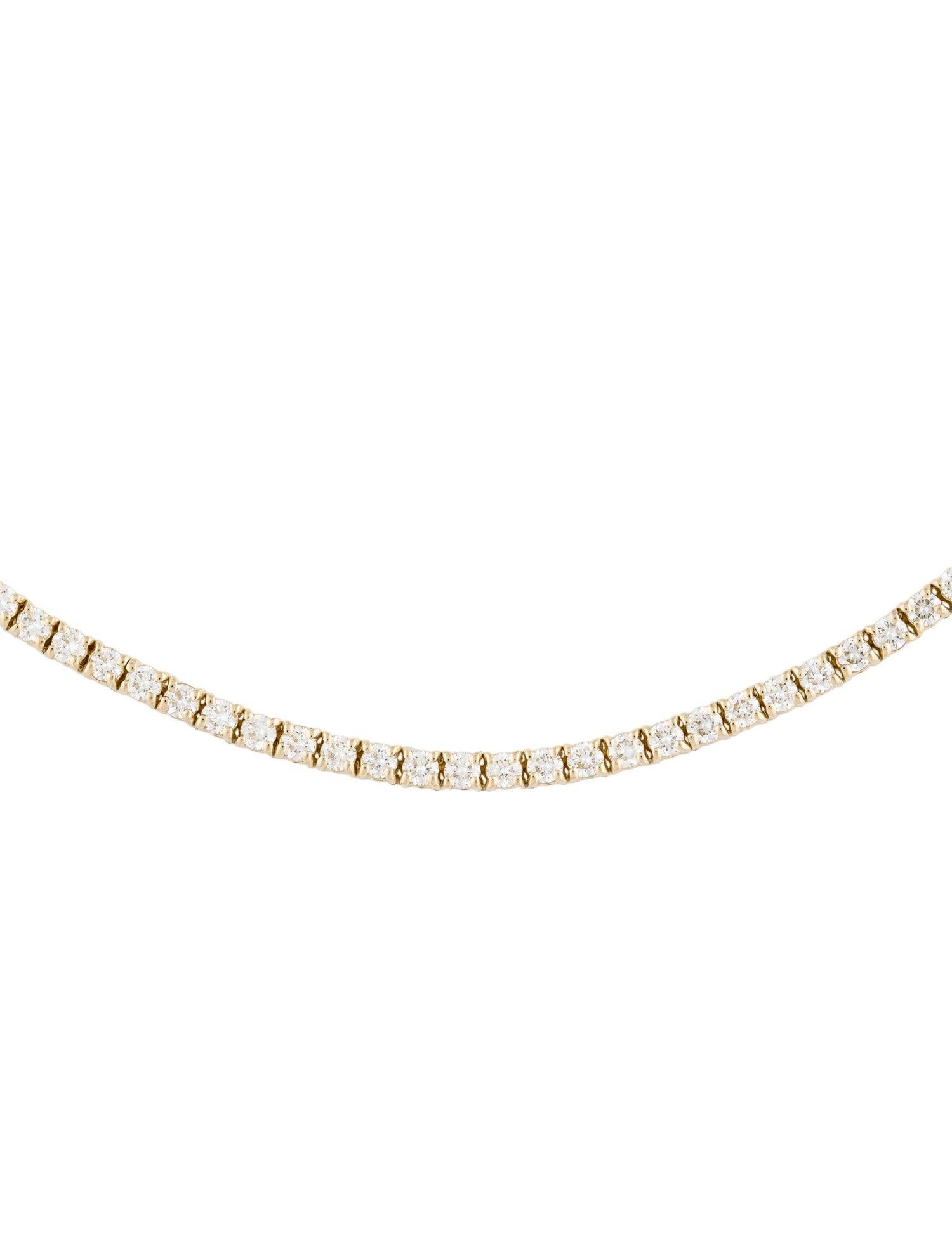 This Classic, Elegant and Beautiful Diamond Necklace will make your look so Glamourous! Crafted of 14K Gold this necklace features 180 natural round white Diamonds weighing approximately 5.05 carats. Necklace measure 17