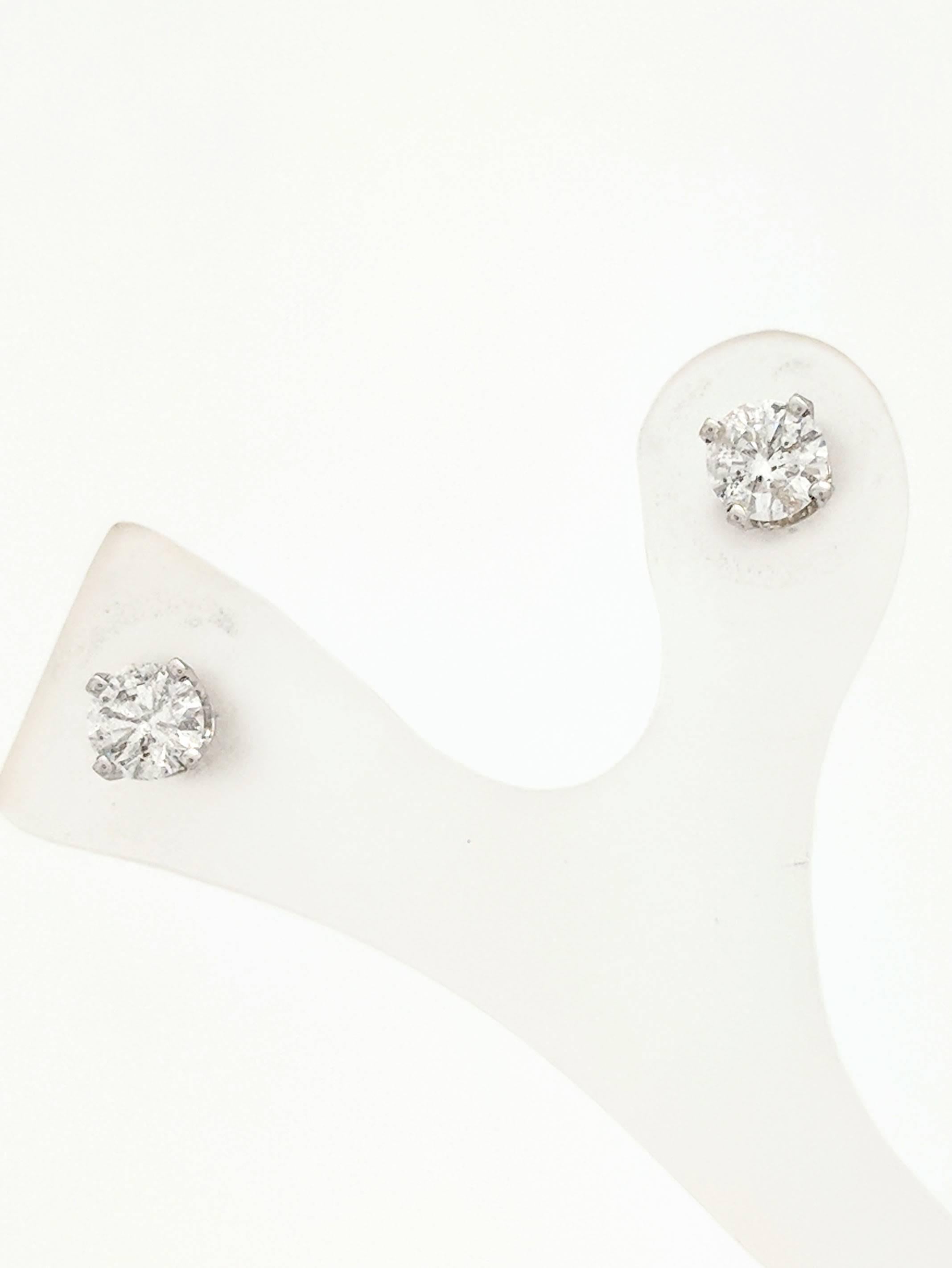 14K White Gold .50ctw Round Brilliant Cut Diamond Stud Earrings I1/H-I

You are viewing a beautiful pair of round brilliant cut diamond stud earrings. These earrings are crafted from 14k white gold and weighs .9 grams. Each earring features (1)