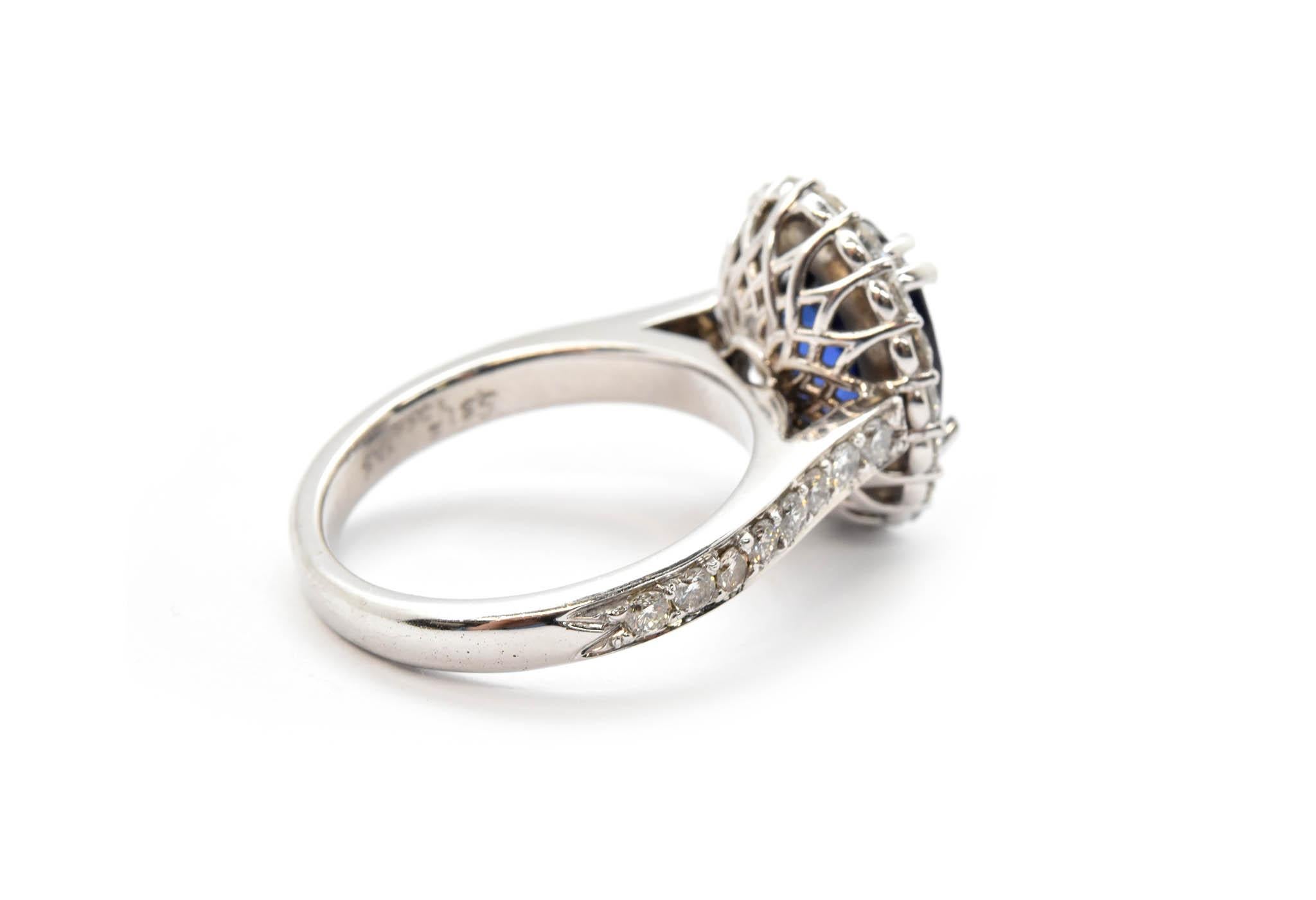 14 Karat White Gold, 5.31 Carat Oval Sapphire and 1.26 Carat Diamond Halo Ring In New Condition In Scottsdale, AZ