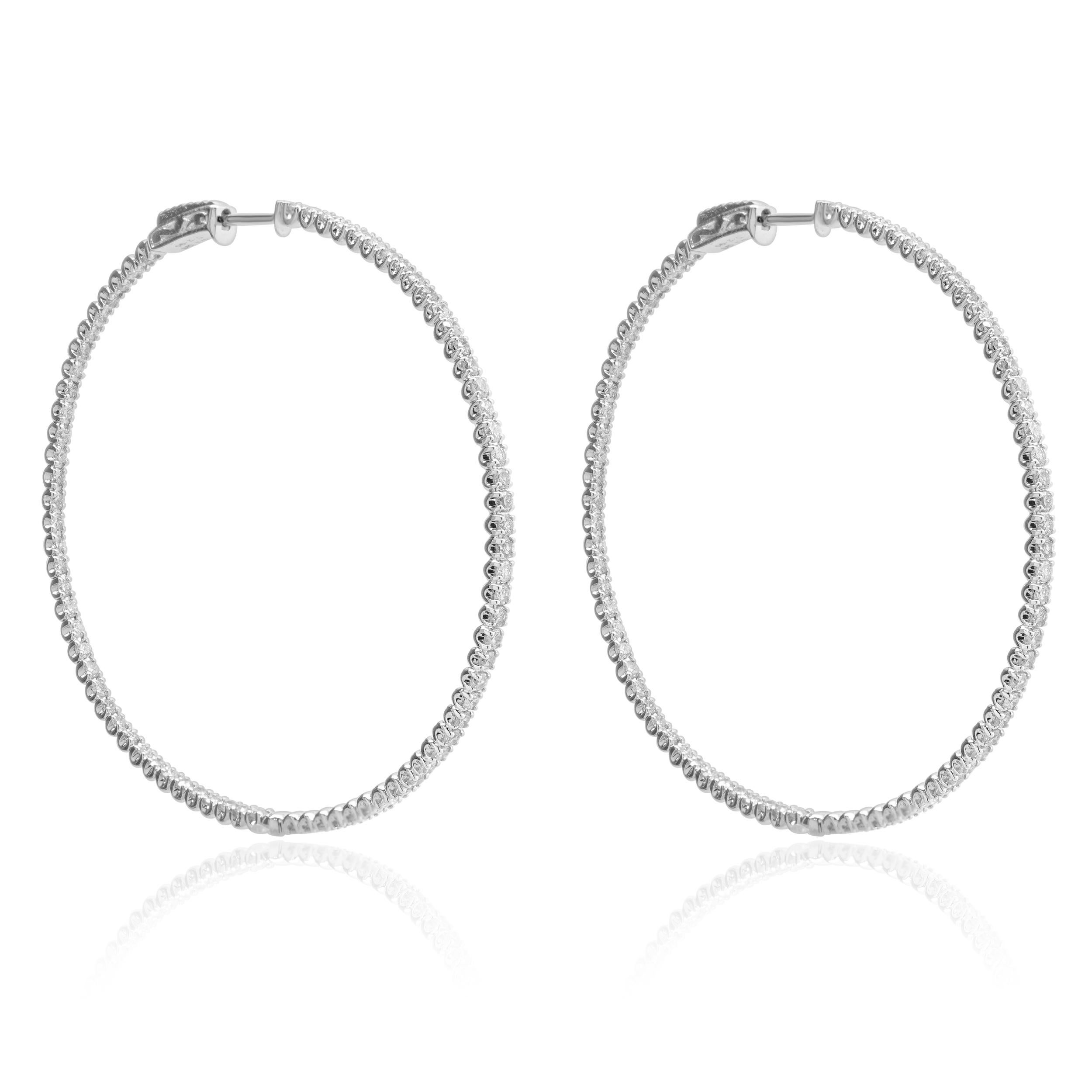 Designer: design personalizzato
Materiale: oro bianco 14 carati
Diamanti: 154 diamanti rotondi taglio brillante = 2,90cttw
Colore: G / H.
Chiarezza: VS-SI1
Dimensioni: gli orecchini misurano 53 mm 
Peso: 9,64 grammi
