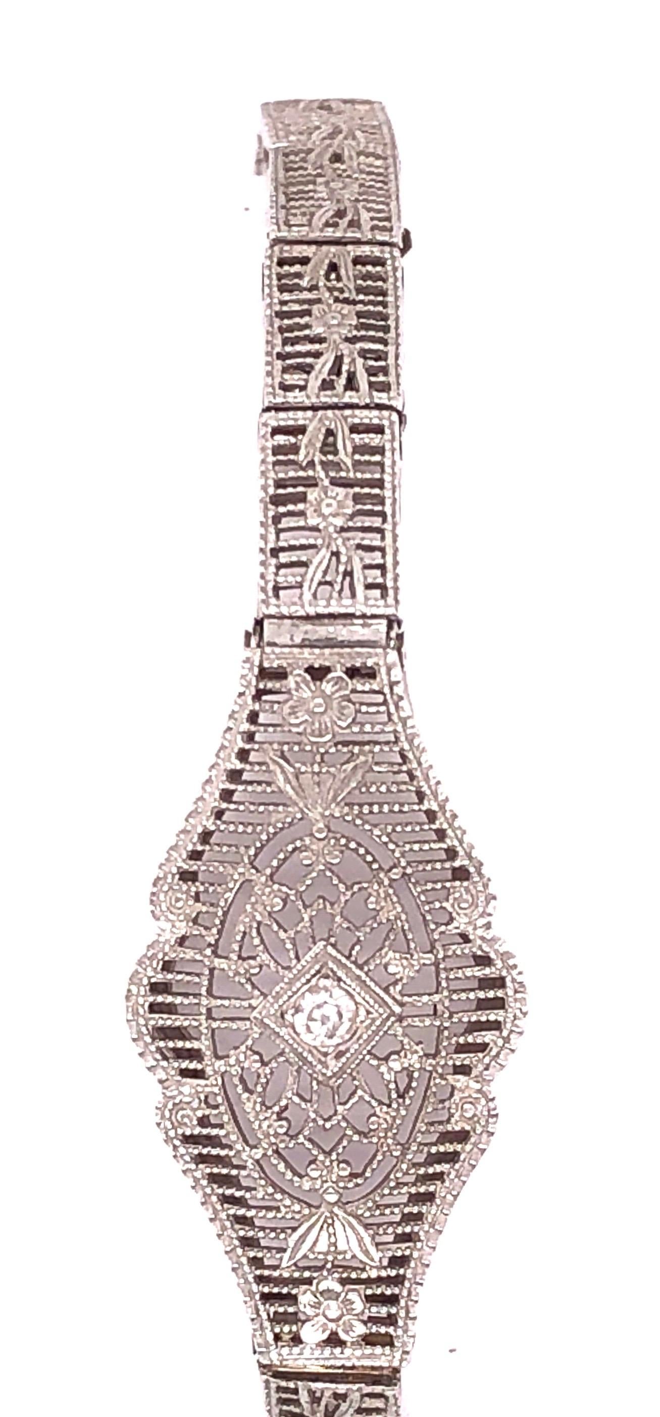 14 Karat White Gold Diamond Solitaire Bracelet Filigree Design For Sale 1