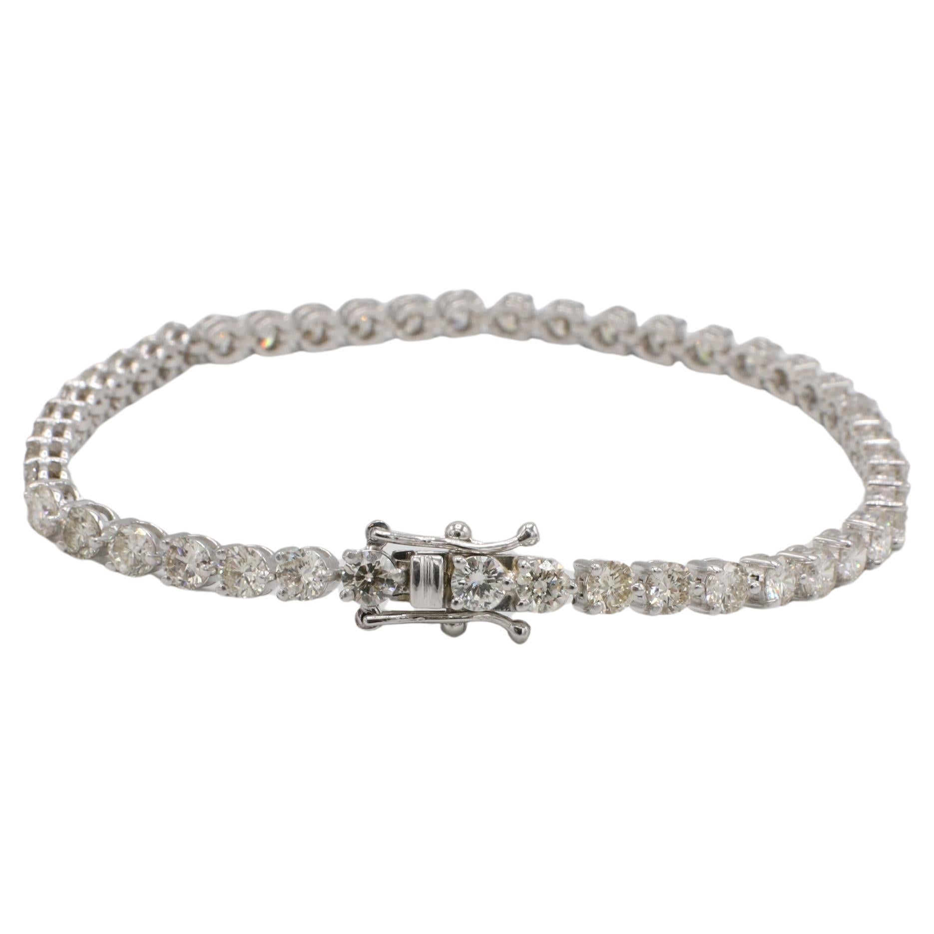 14 Karat White Gold 6.50 Carat Natural Diamond Tennis Line Bracelet
Metal: 14k white gold
Weight: 8.75 grams
Diamonds: 46 round natural diamonds 6.50 CTW I-J VS-SI
Length: 7 inches
Width: 3.3mm
ADDD F35000798
