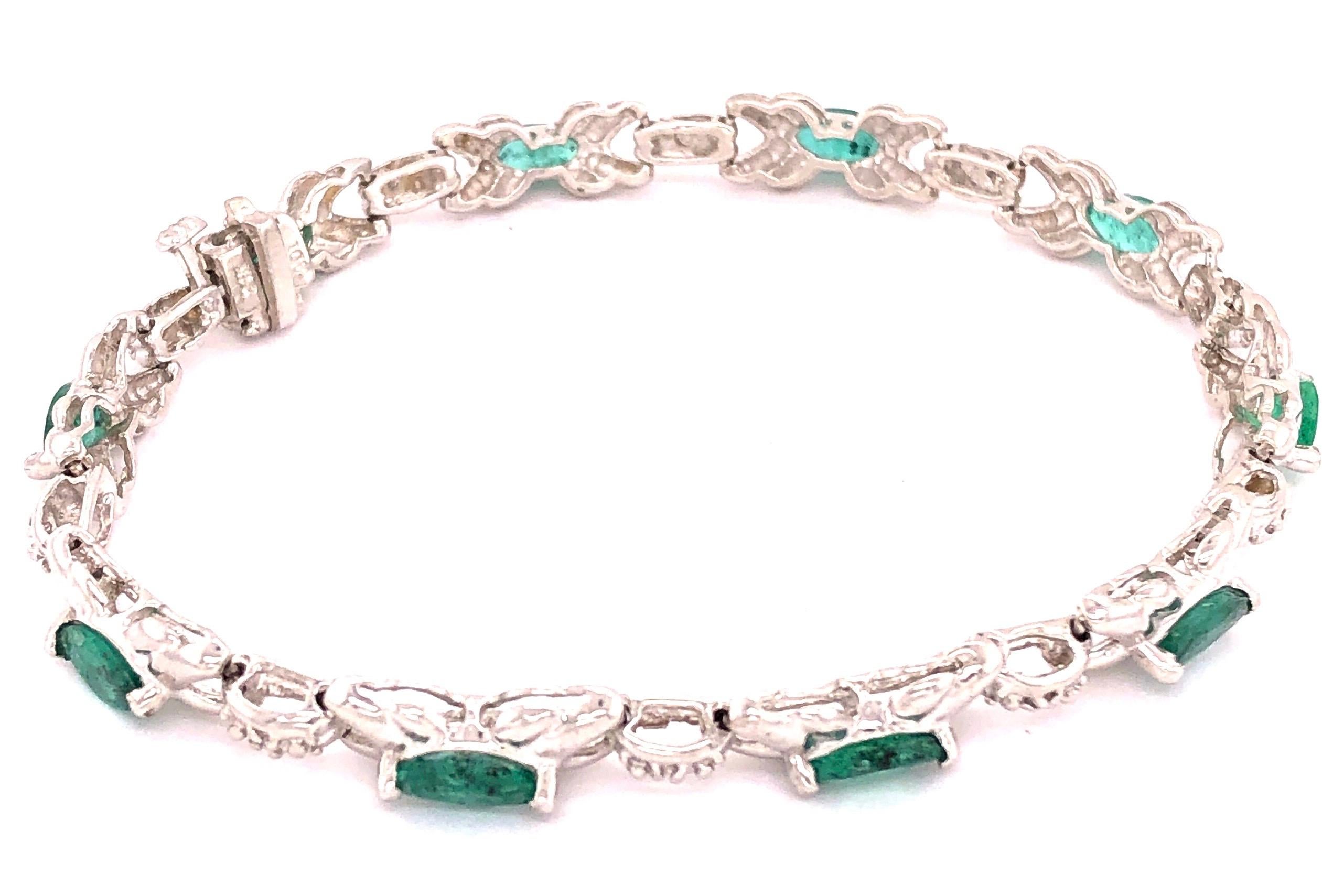 14 Karat White Gold Emerald Bracelet with Round Diamonds 7