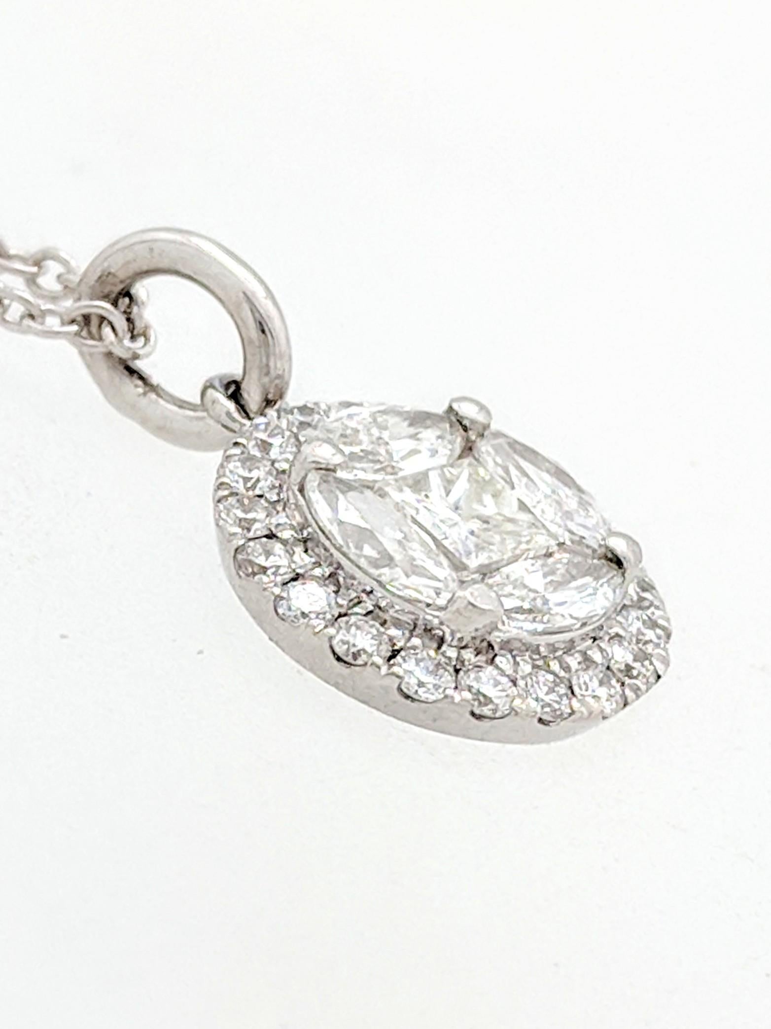 14 Karat White Gold .75 Carat Illusion Set Halo Diamond Pendant Necklace In Excellent Condition For Sale In Gainesville, FL