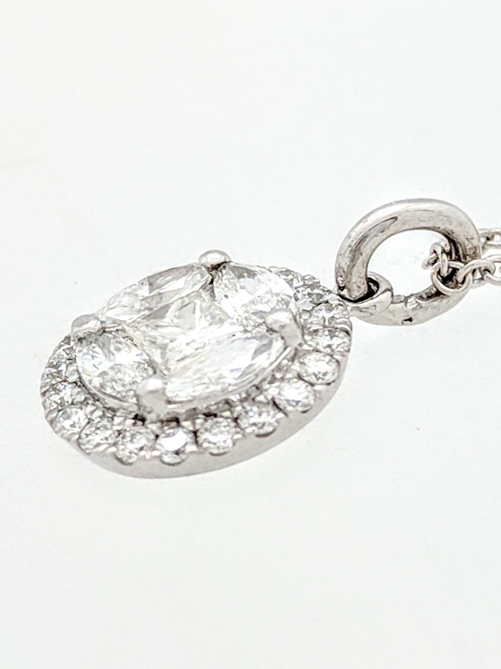 Women's 14 Karat White Gold .75 Carat Illusion Set Halo Diamond Pendant Necklace For Sale