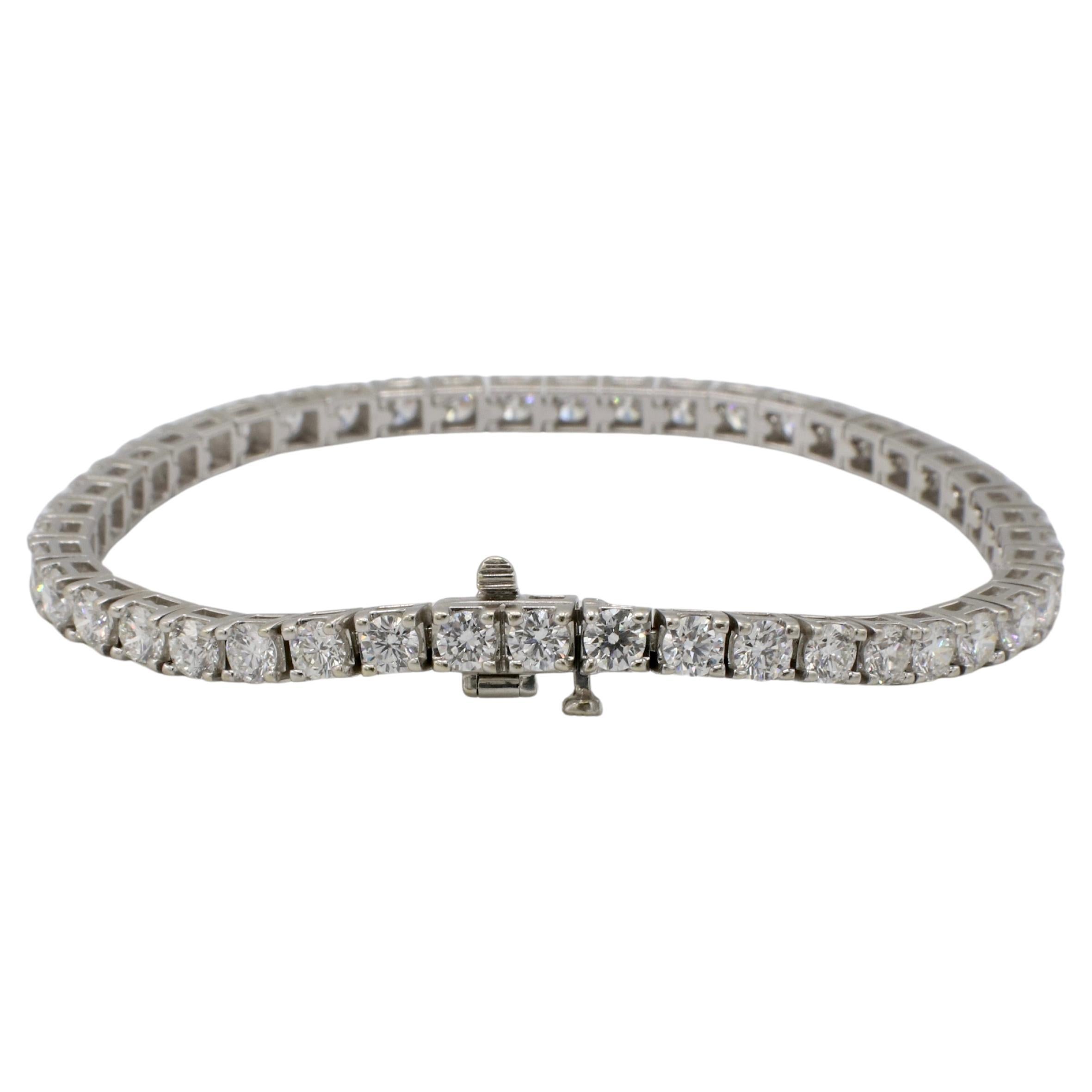 14 Karat White Gold 8.00 Carat Natural Diamond Tennis Line Bracelet 
Metal: 14k white gold
Weight: 14.72 grams
Diamonds: 46 round natural diamonds approx. 8.00 CTW G-H VS
Length: 7 inches
Width: 3.7mm
