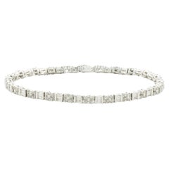 14 Karat White Gold Alternating Round and Baguette Cut Diamond Tennis Bracelet 14 Karat White Gold Alternating Round and Baguette Cut Diamond Tennis Bracelet