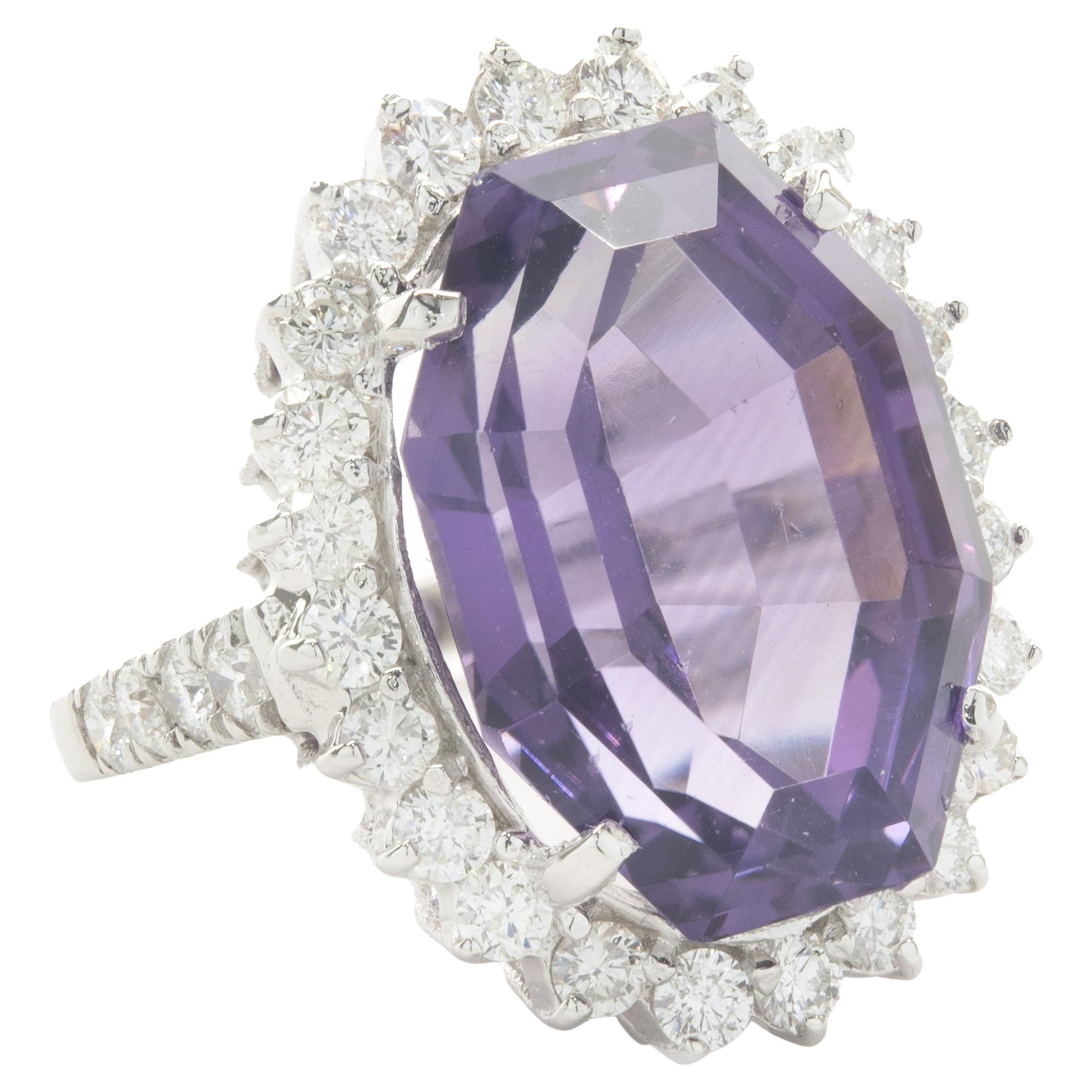 Designer: custom
Material: 14K white gold
Diamond: 24 round brilliant cut = 1.28cttw
Color: H
Clarity: VS2
Amethyst: 1 oval cut = 14.81ct
Ring Size: 6.5 (please allow up to 2 additional business days for sizing requests)
Weight:  9.04 grams