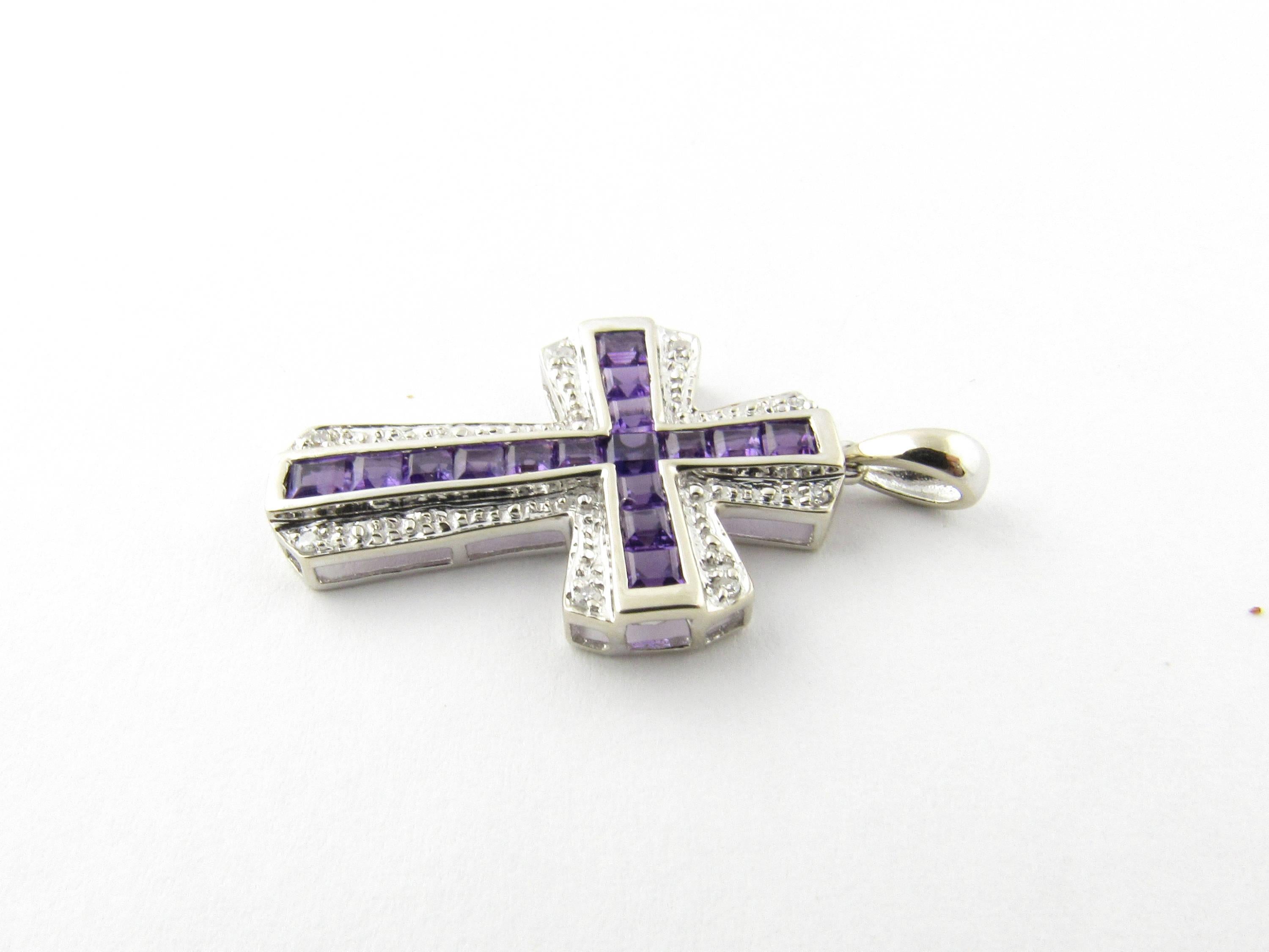 Vintage 14 Karat White Gold Amethyst and Diamond Cross Pendant-

This stunning cross pendant features 16 amethyst stones and eight round single cut diamonds set in classic 14K white gold.

Approximate total diamond weight: .04 ct.

Diamond color: