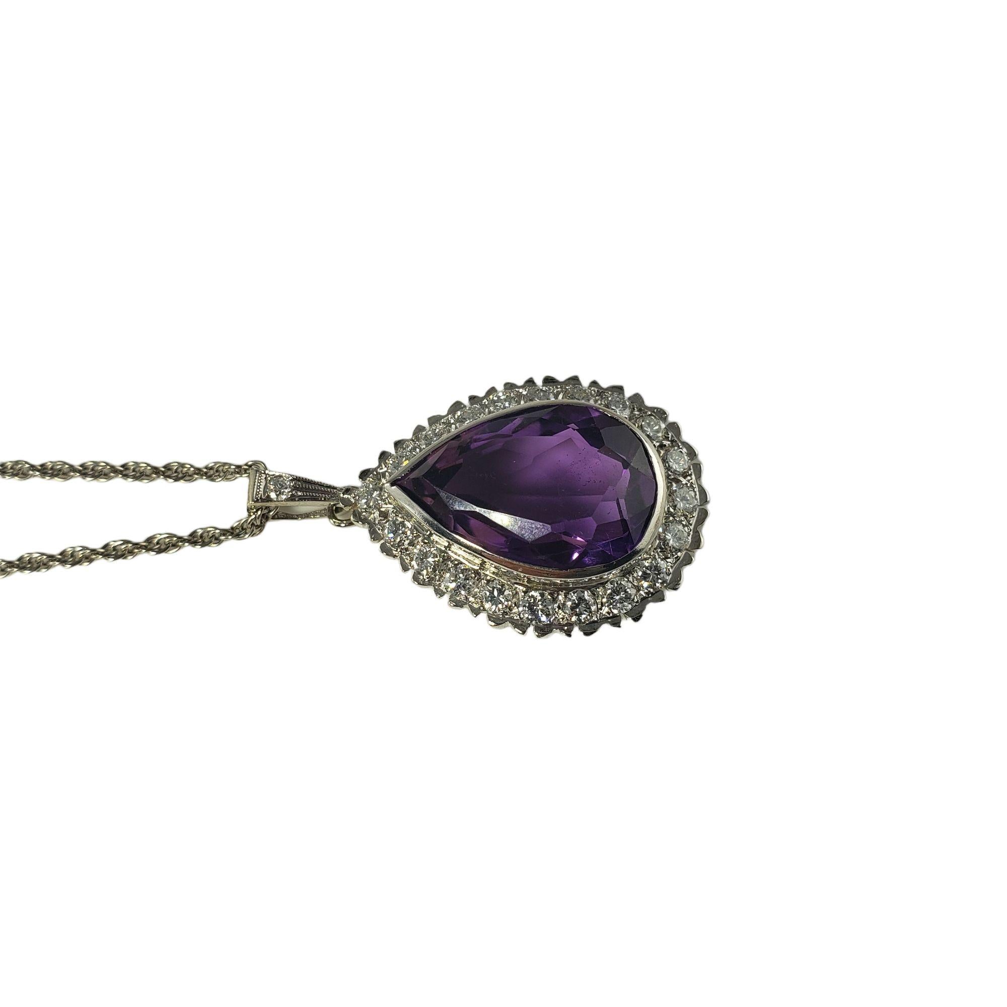 Vintage 14 Karat White Gold Amethyst and Diamond Pendant Necklace JAGi Certified-

This stunning pendant necklace features one pear-shaped amethyst (20 mm x 14 mm) and 21 round brilliant cut diamonds set in classic 14K white gold.

Amethyst weight: