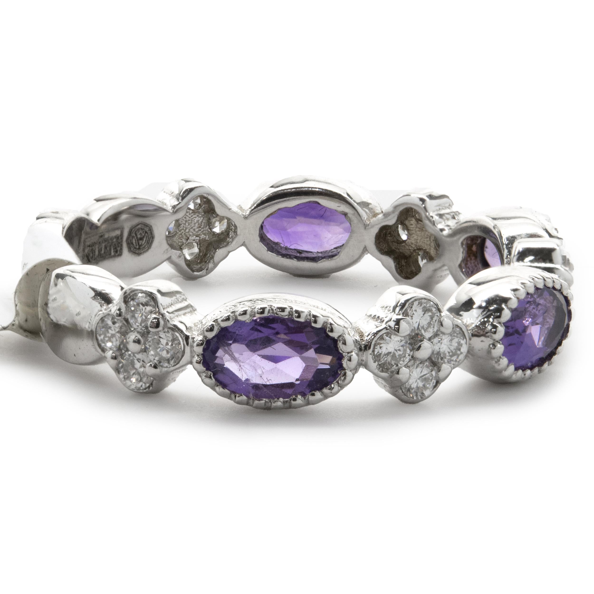 Designer: custom design
Material: 14K white gold
Amethyst: 4 oval cut = 0.42cttw
Diamond: 20 round brilliant cut = .27cttw
Color: G
Clarity: SI1
Dimensions: band measures 4.10mm wide
Ring Size: 7 (complimentary sizing available)
Weight: 3.45 grams
