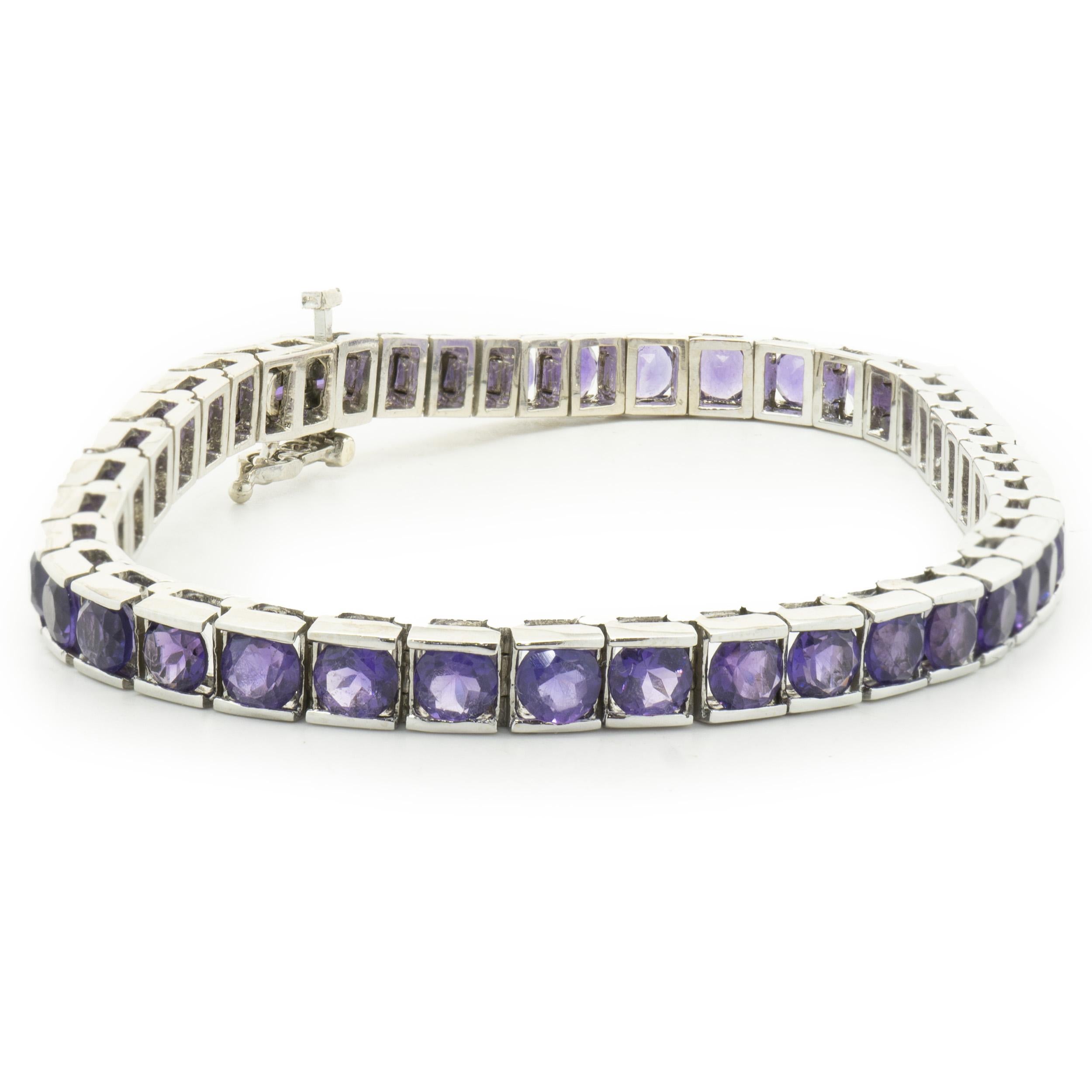 Designer: custom
Material: 14K white gold
Amethyst: 43 princess cut = 6.45cttw
Weight: 17.00 grams
Dimensions: bracelet will fit up to a 7-inch wrist
