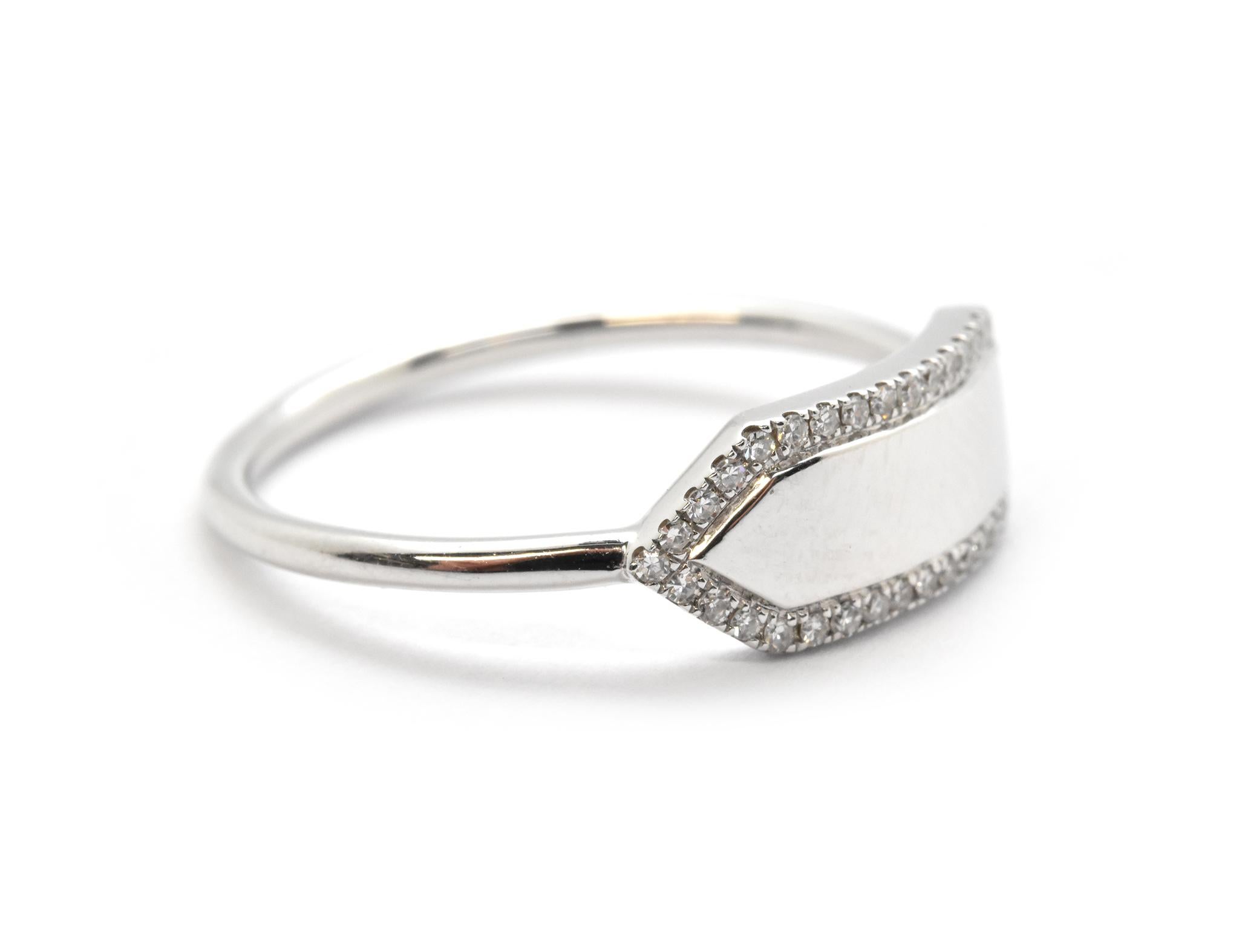 This chic ring is made in 14k white gold and set with 0.11ct in round diamonds. The ring measures 6mm wide, and it is perfect to customize with your own engraving! The ring weighs 2.2 grams, and it is size 7.25.