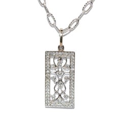 Pendentif vintage en or blanc 14 carats et diamants de 0,60 carat, 3,90 grammes