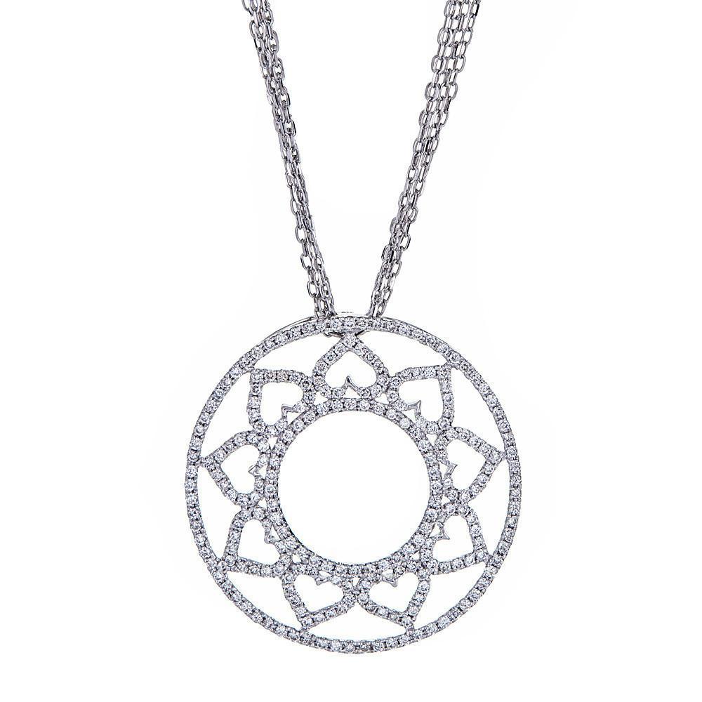 This lovely flower pendant is handcrafted in 14K white gold with diamonds studded throughout. Chain not included.
