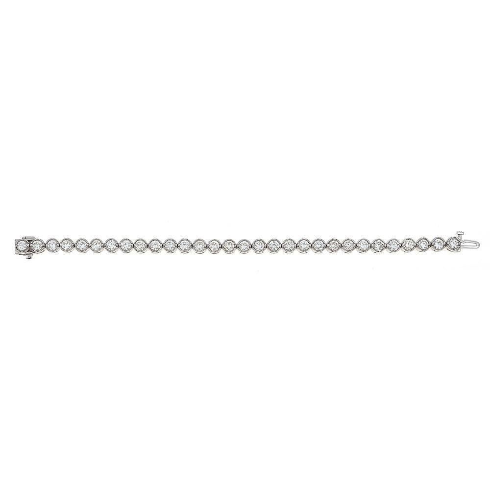 10.5 Carat Diamond Fine Tennis Bar Bracelet 14 Karat White Gold Gift for Her

An elegant diamond tennis bracelet, showcasing encrusted round, brilliant diamonds. An elegant, and fashion-forward addition to any look. Fashioned in white gold, with a