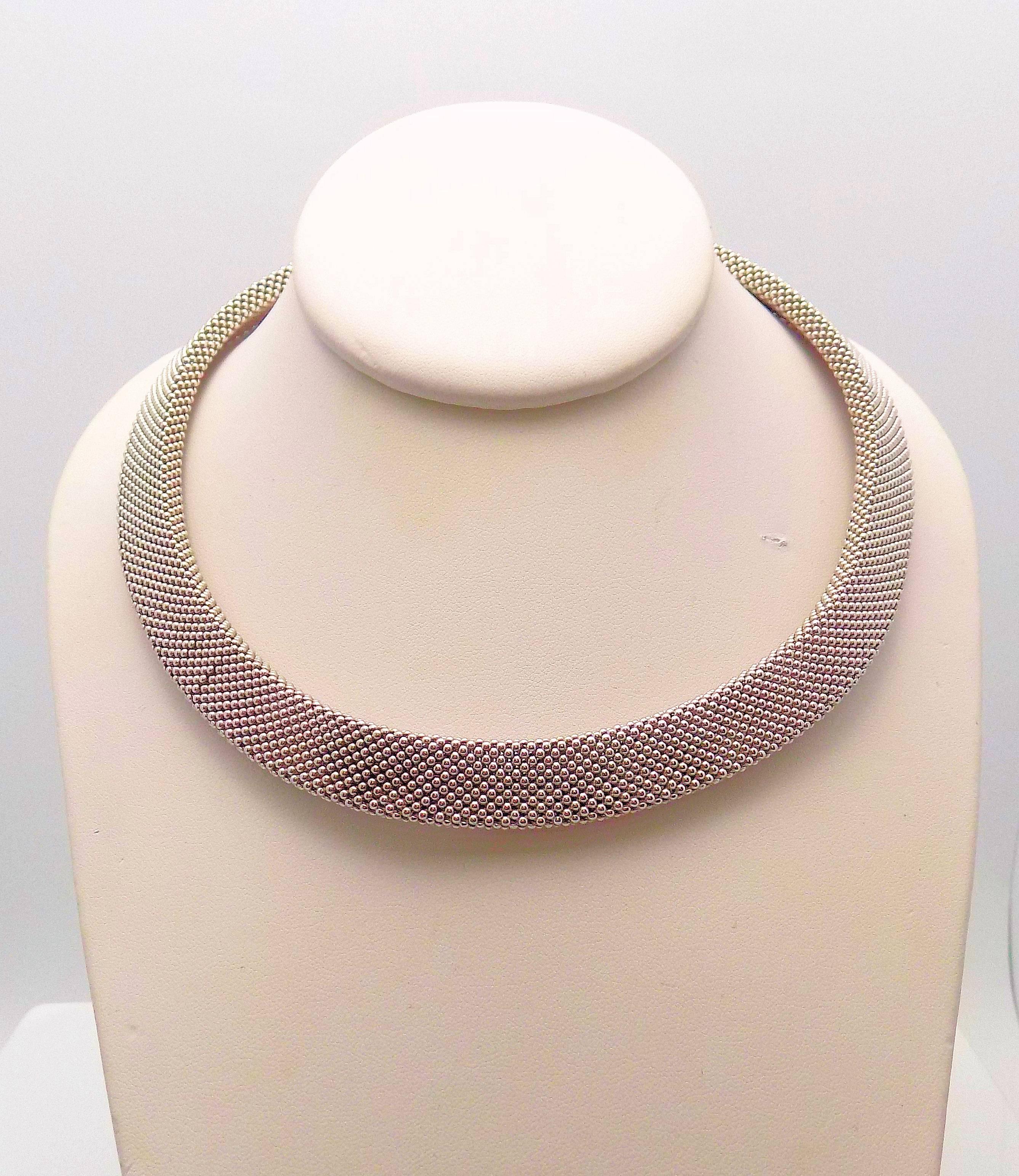 Classic Italian Design on this 14 Karat White Gold and 14 Karat Yellow Gold Woven Necklace 13.5 MM Wide, Length 17