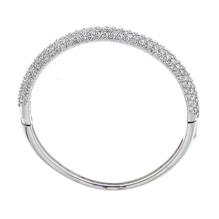 6.42 Carat Diamond Hinged Bangle Bracelet 14 Karat White Gold Fine Jewelry

A gorgeous addition to your jewelry collection.  Five rows of round Shimmering Diamonds of the best quality are set to of this hinged bracelet in a pavé setting, together