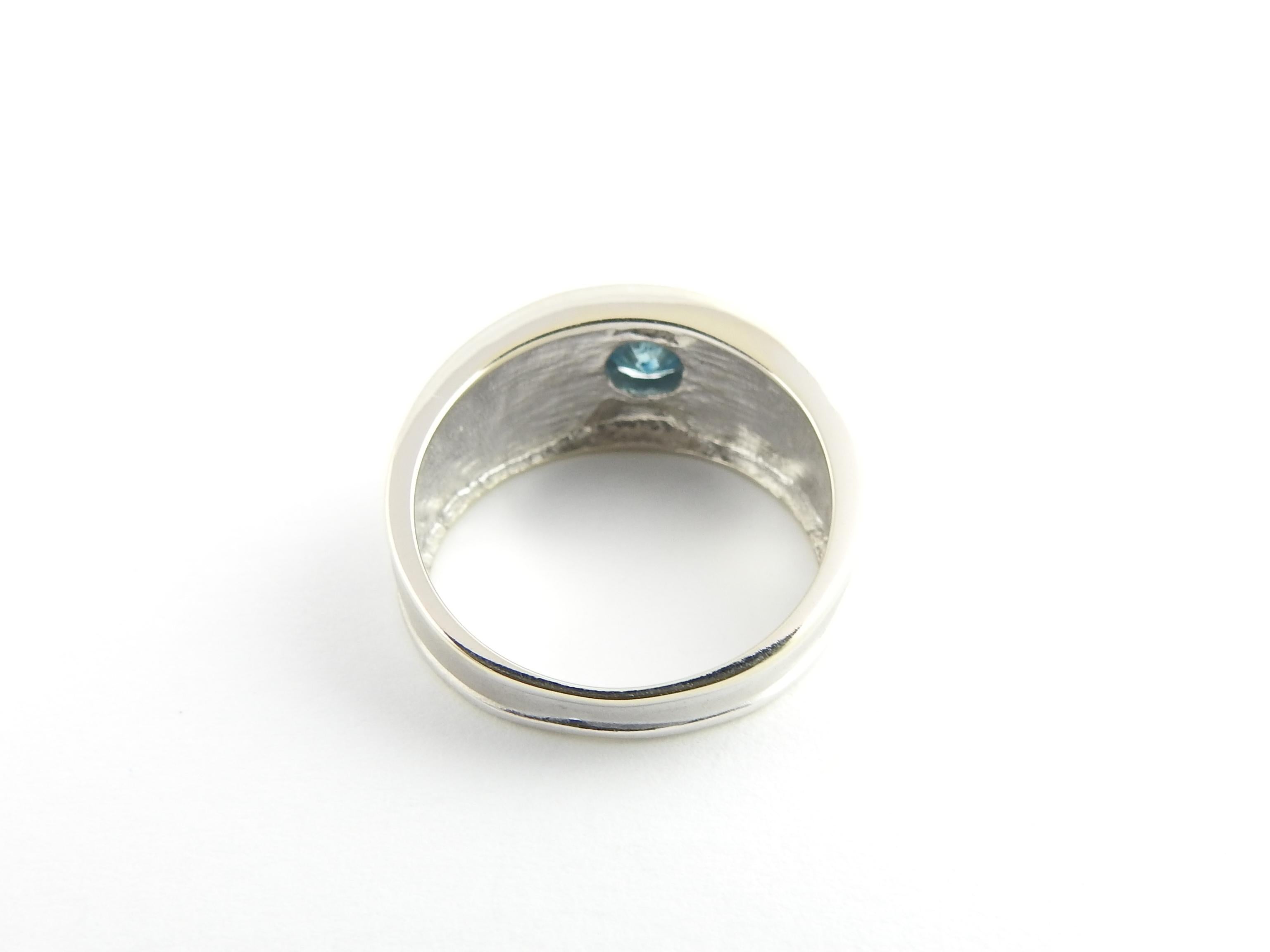 Round Cut 14 Karat White Gold and Blue Diamond Ring