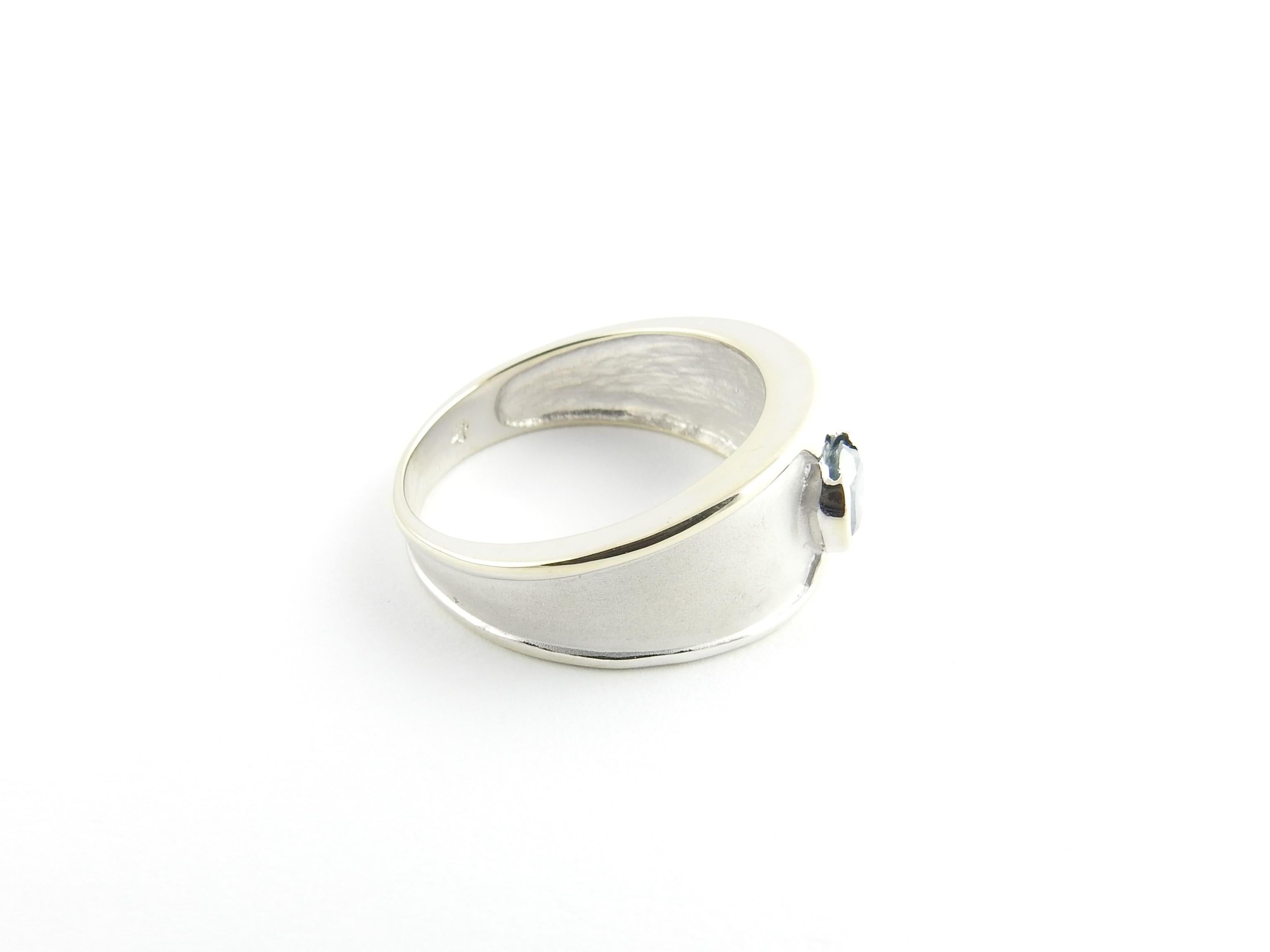 Women's 14 Karat White Gold and Blue Diamond Ring