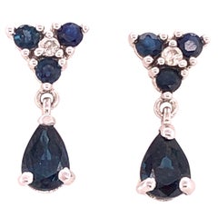 14 Karat White Gold and Blue Sapphire Drop Earrings 0.02 Total Diamond Weight