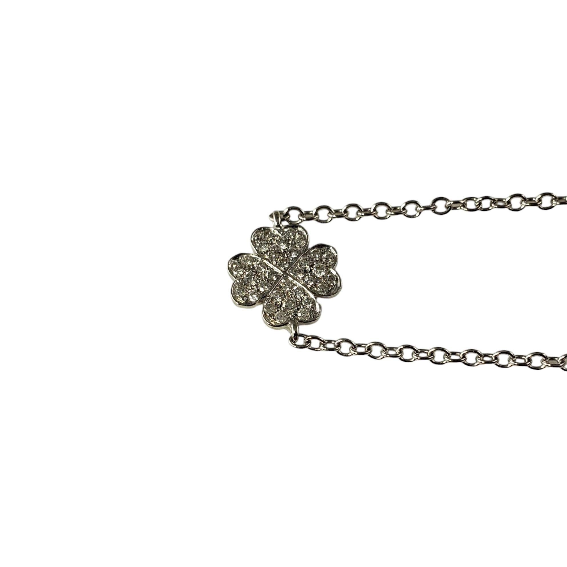 14 Karat White Gold and Diamond Clover Bracelet-

This lovely four leaf clover bracelet features 32 round brilliant cut diamonds set in classic 14K white gold.

Approximate total diamond weight: .20 ct.

Diamond clarity: SI1

Diamond color: