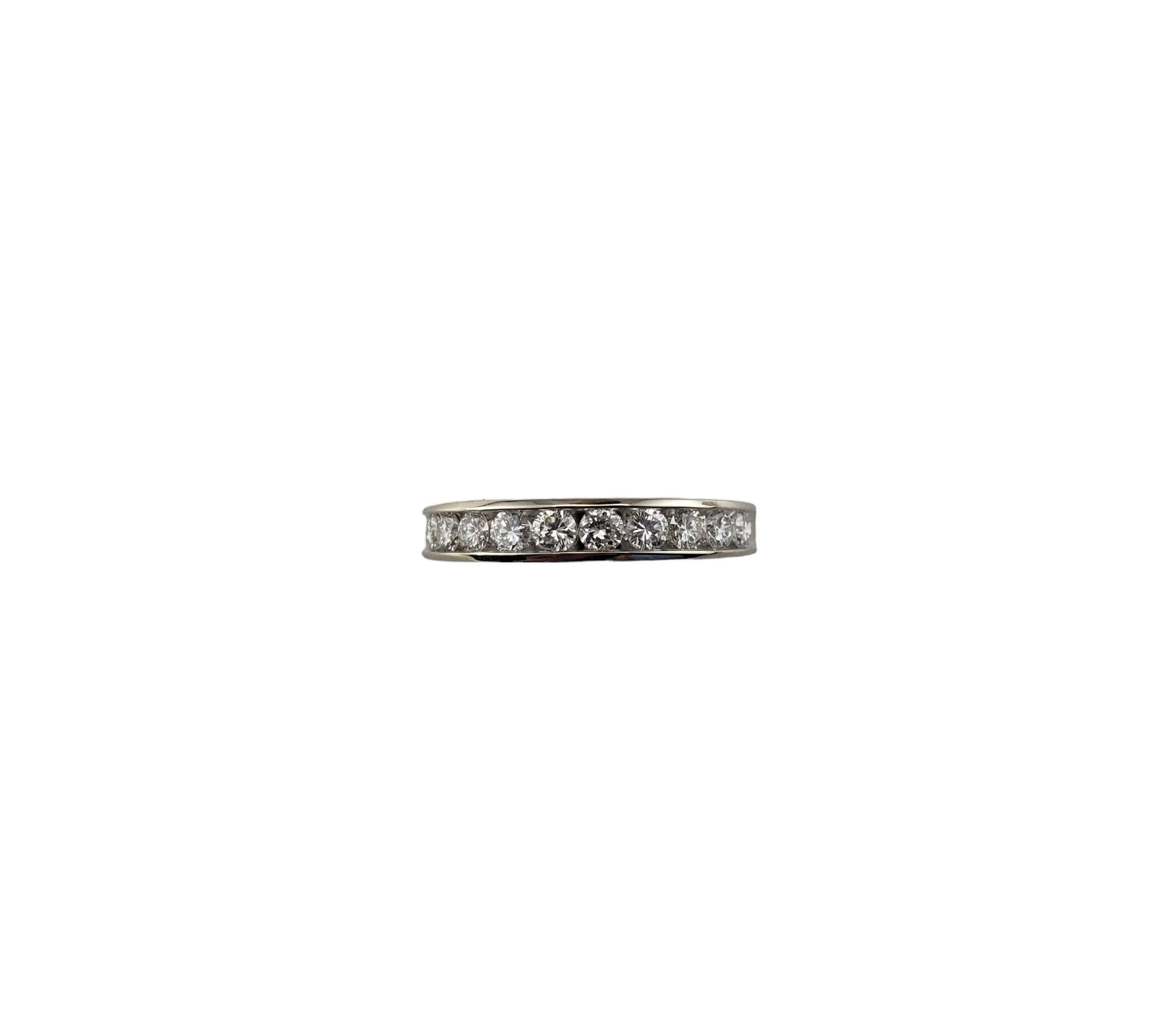 14 Karat White Gold and Diamond Band Ring Size 6-

This sparkling band features 10 round brilliant cut diamonds set in classic 14K white gold.  Width:  3 mm.  Shank:  2.3 mm.

Approximate total diamond weight:  .50 ct.

Diamond Color:  G

Diamond