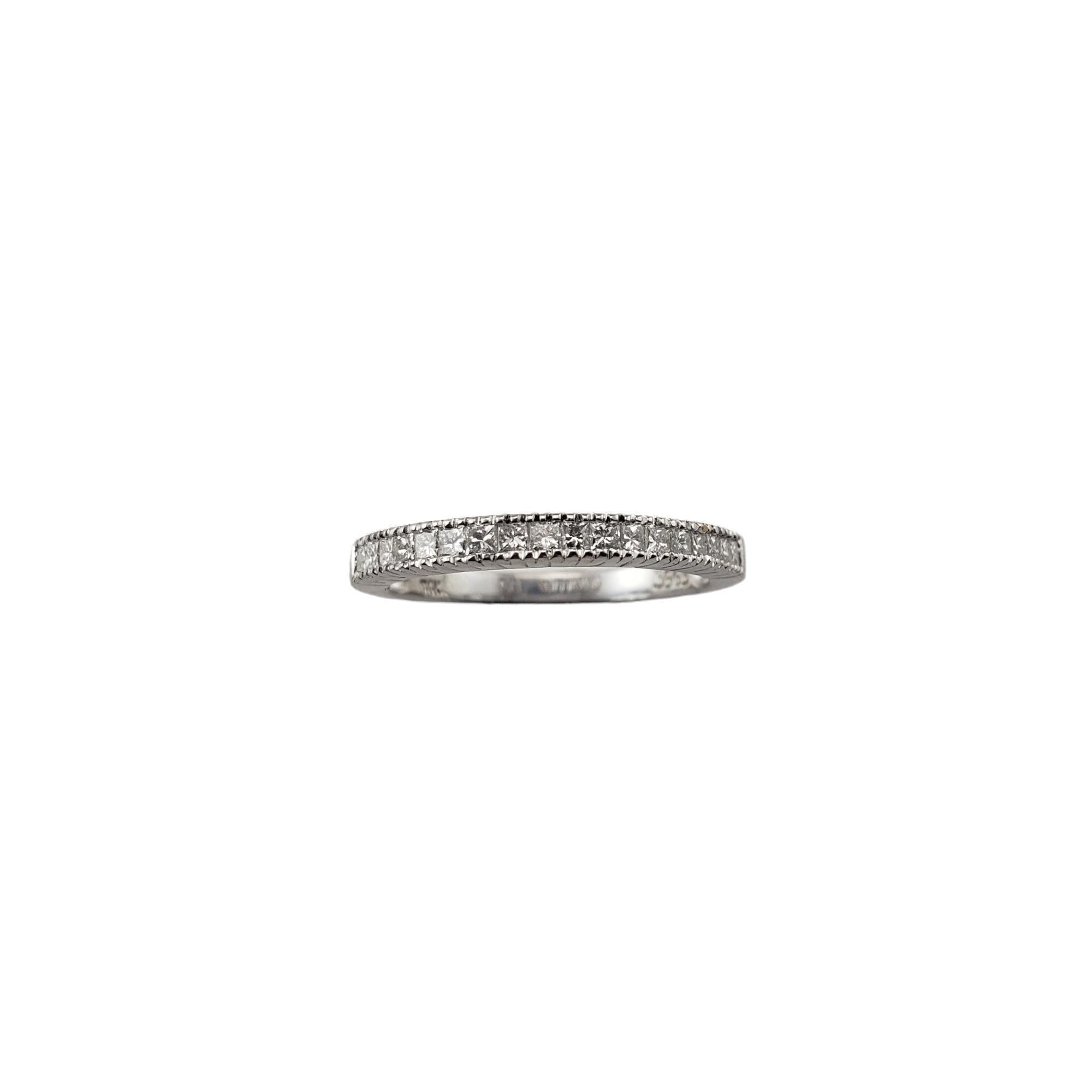 Vintage 14 Karat White Gold and Diamond Band Ring Size 6.5-

This sparkling band features 18 princess cut diamonds set in classic 14K white gold.  Width:  2.1 mm.

Approximate total diamond weight:   .36 ct.

Diamond clarity: VS1

Diamond color:
