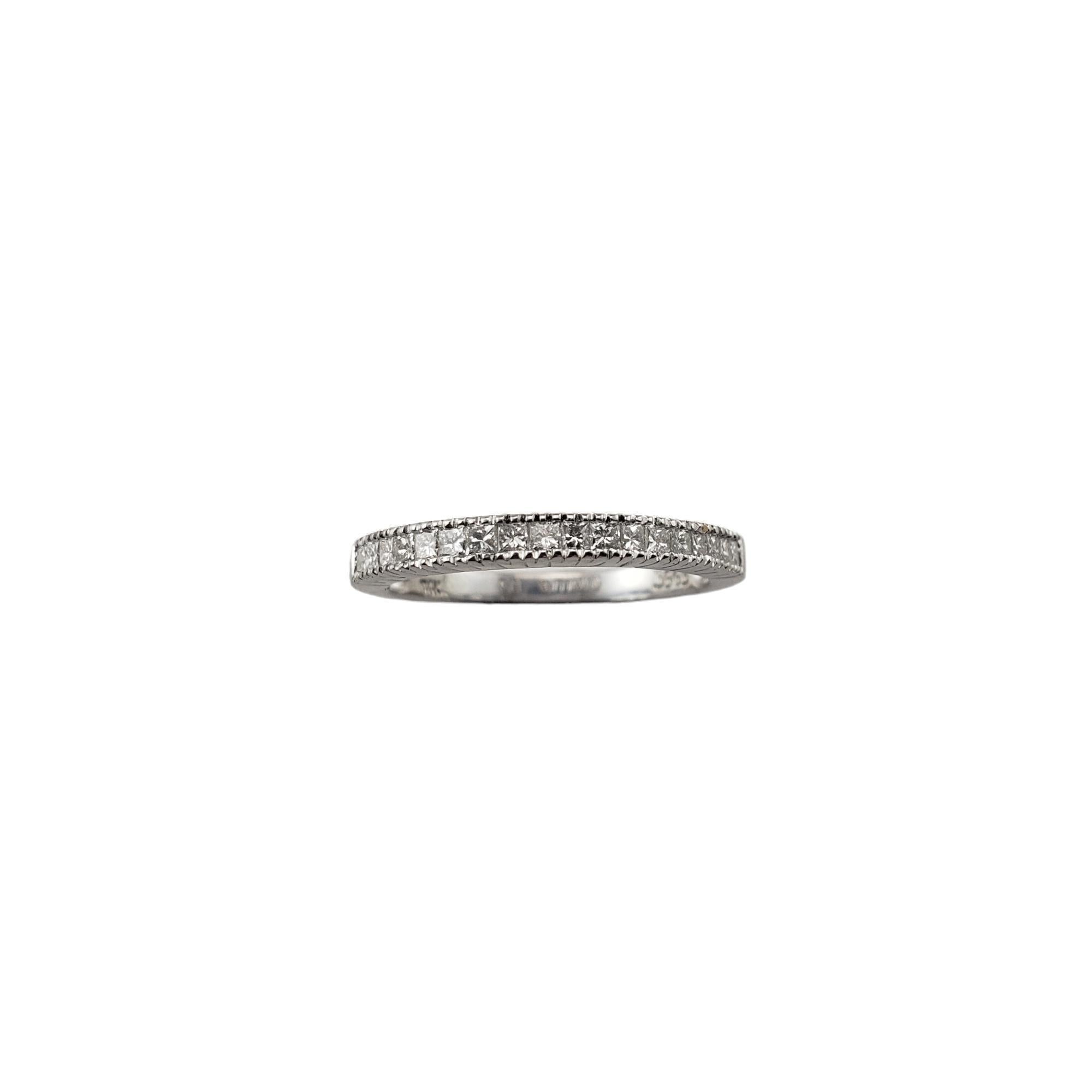 Vintage 14 Karat White Gold and Diamond Band Ring Size 6.5

This sparkling band features 18 princess cut diamonds set in classic 14K white gold. Width: 2.1 mm.

Approximate total diamond weight: .36 ct.

Diamond clarity: VS1

Diamond color:
